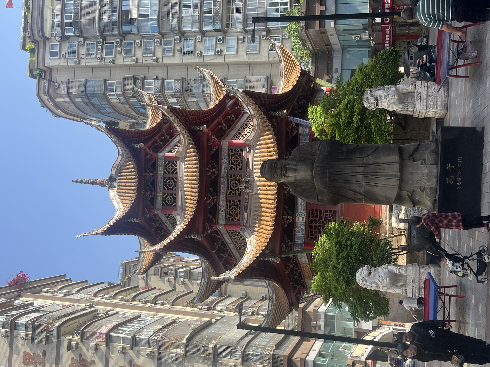 Traditional pagoda, stone statue observed in Jiangjin urban scene