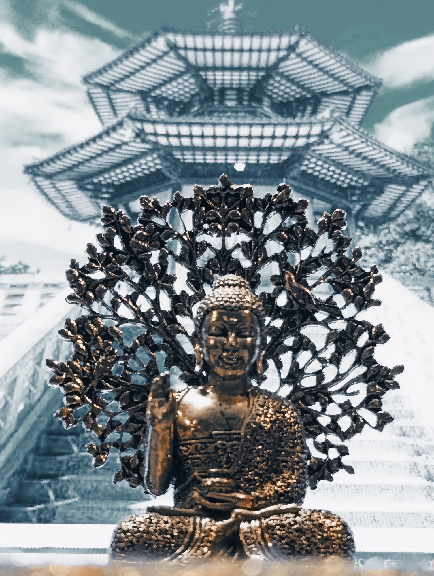 Close-up details of an ornate golden Buddha statue in Vashisht