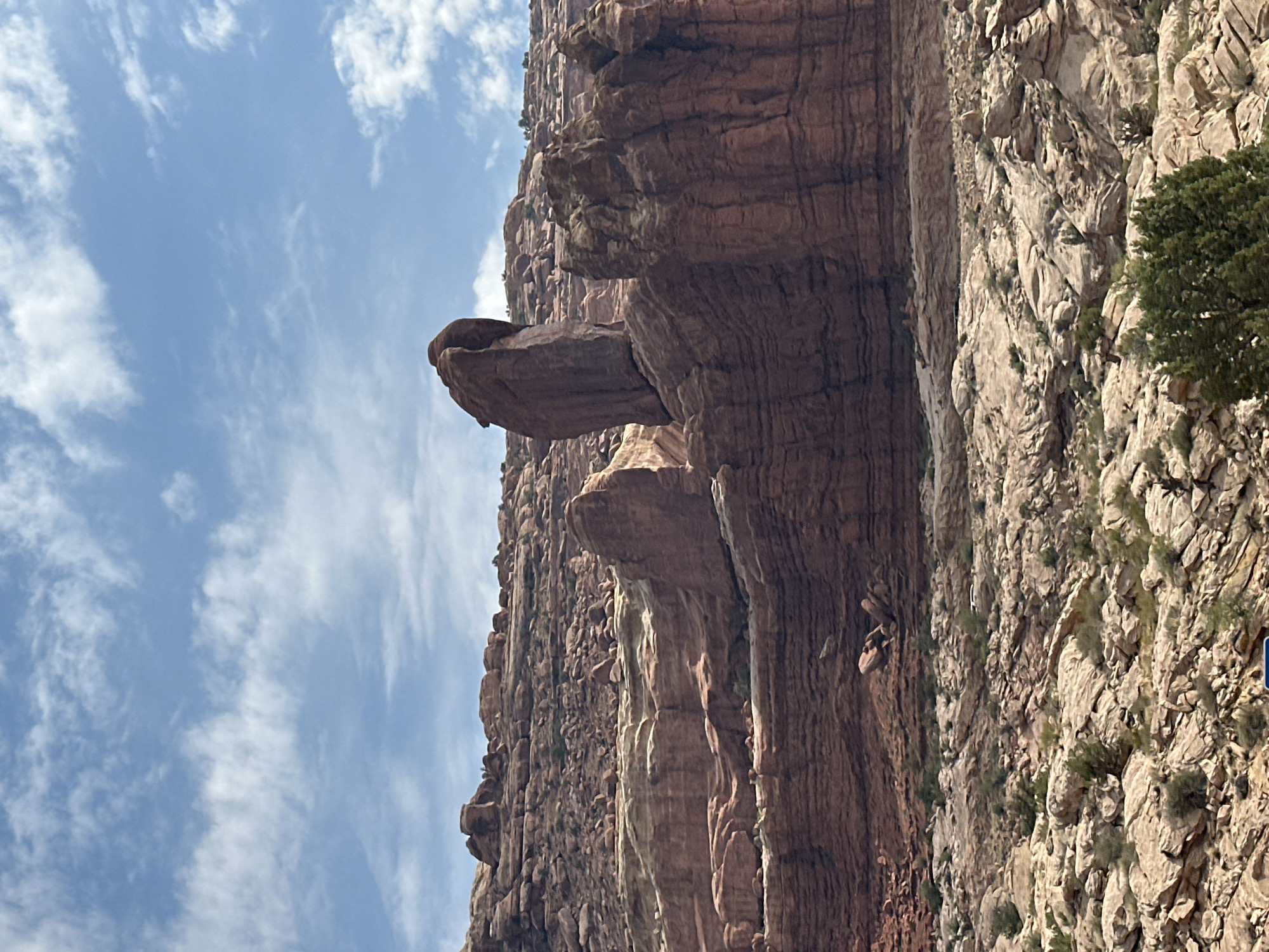 Red rock formations and open road outside Moab, Utah