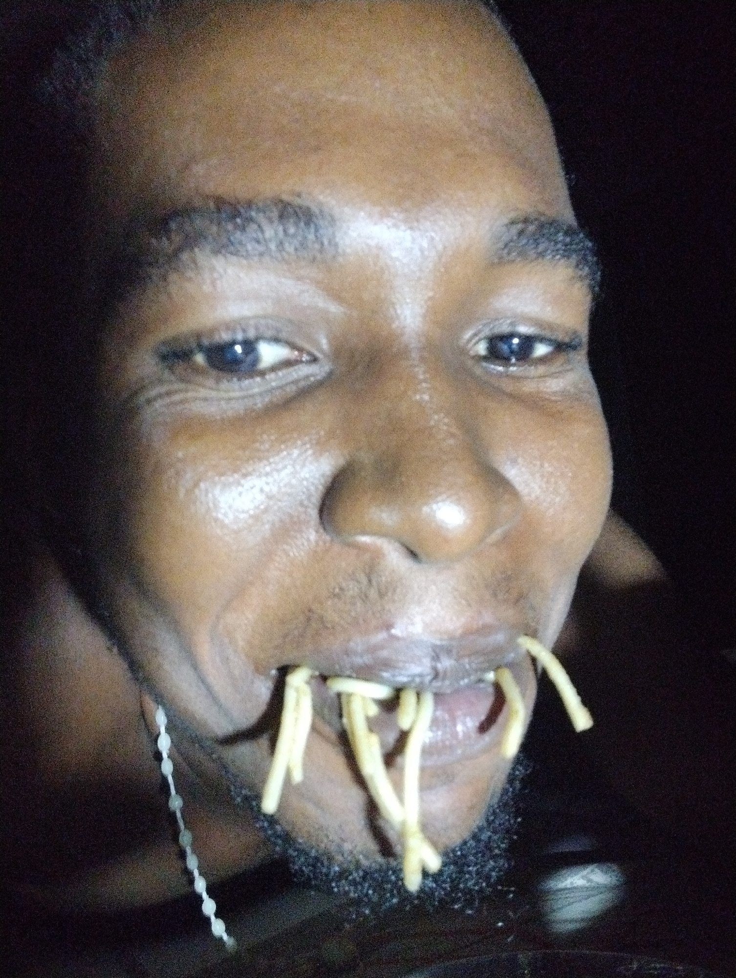 Man enjoys pasta dinner in Ihiagwa, Nigeria