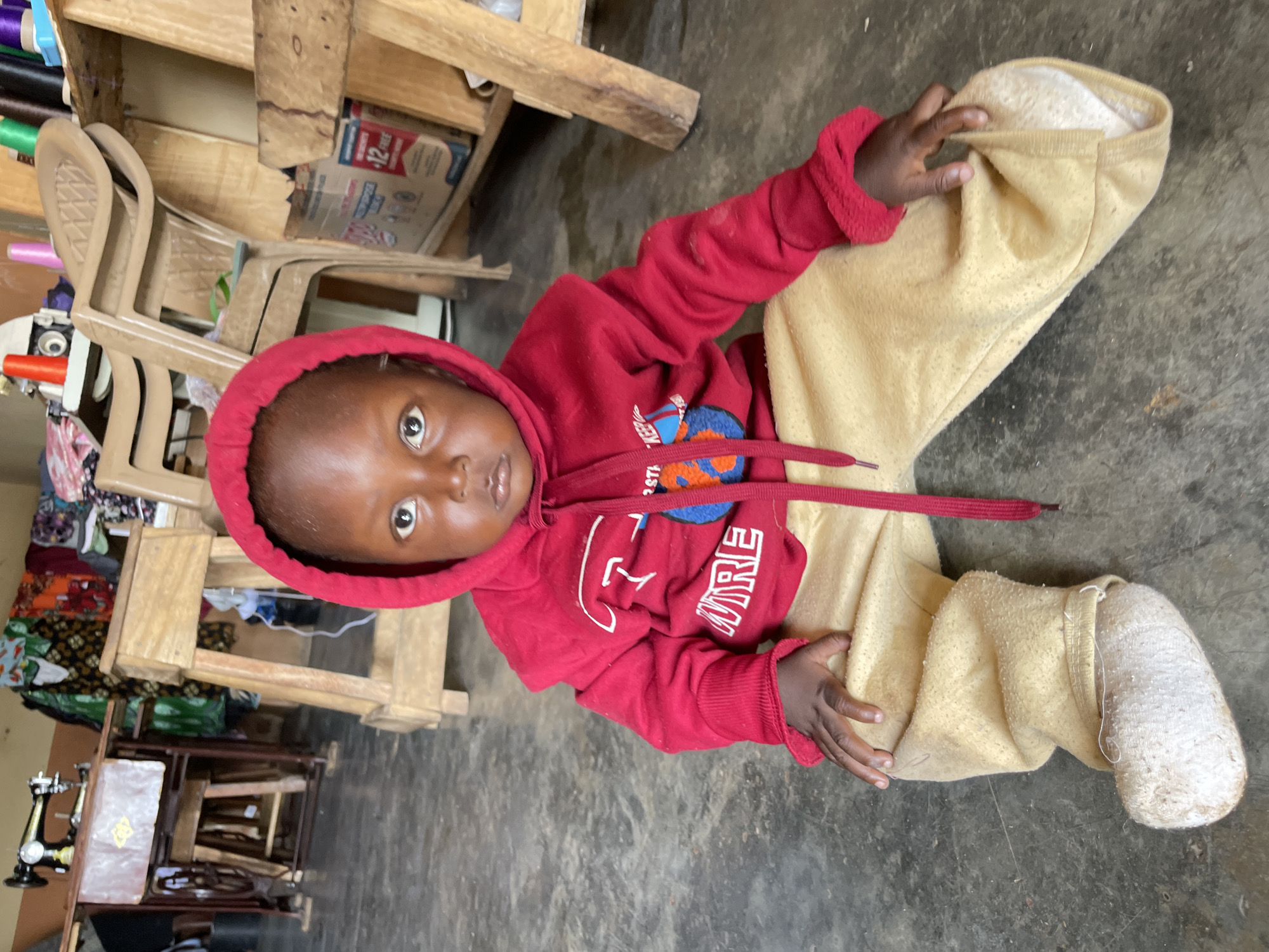 Morning life in a Jos sewing workshop and surrounding streets