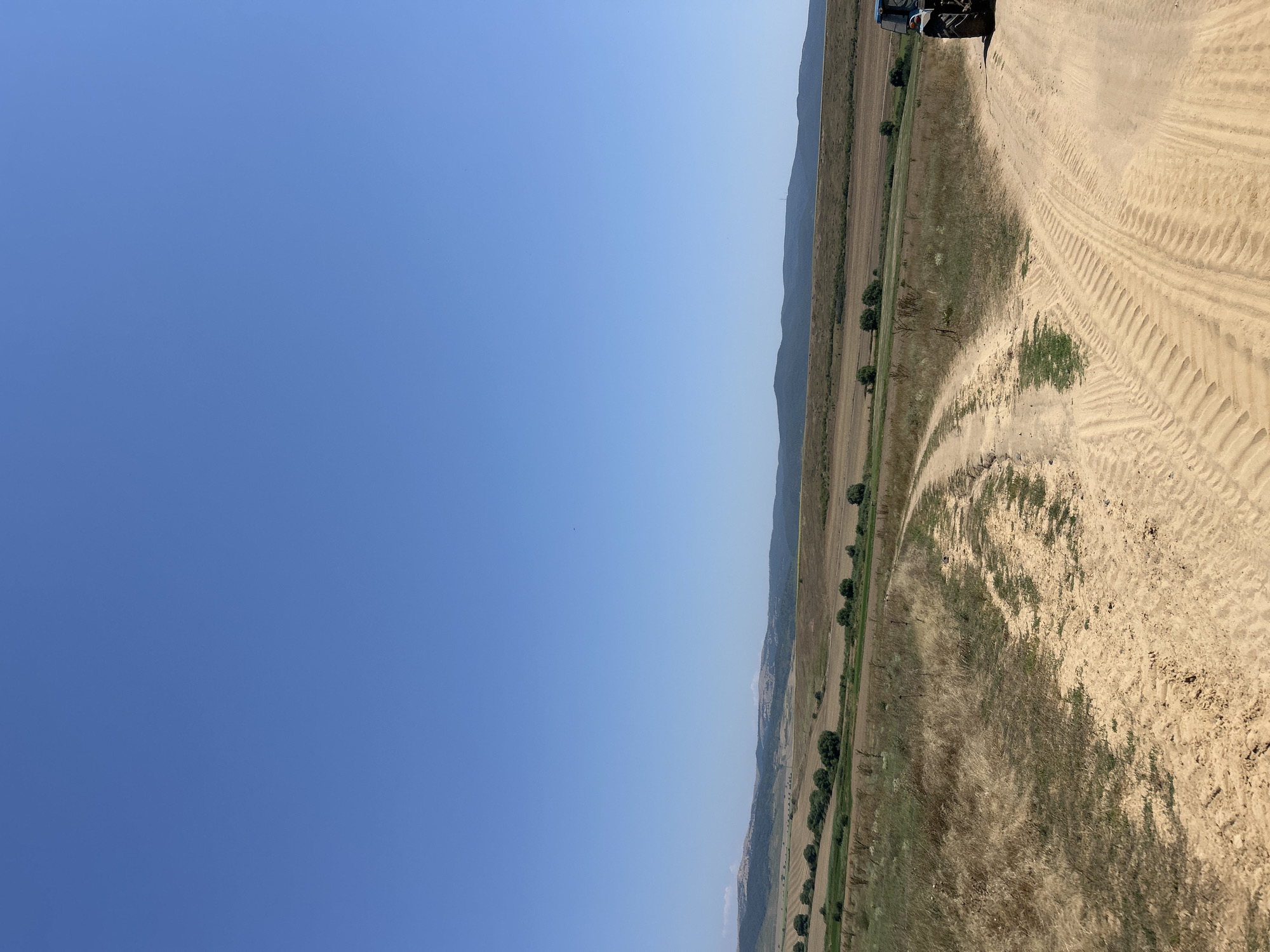 Dusty rural roads and dry grassland near Poroy, Bulgaria