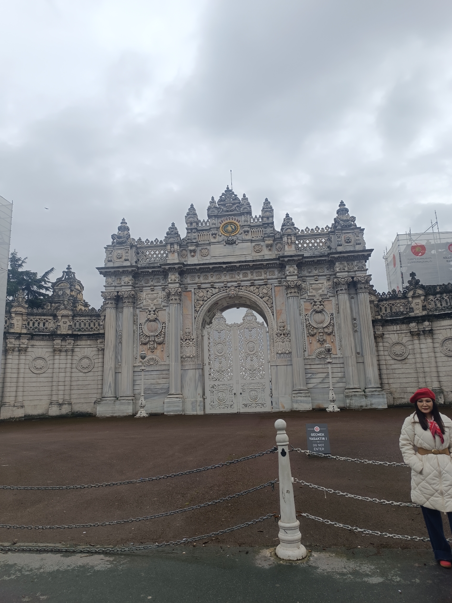 Dolmabahçe Palace exterior documented under overcast skies in Istanbul