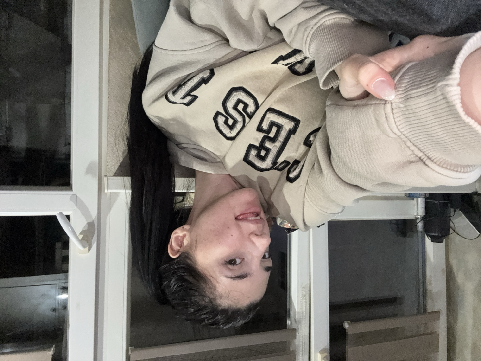 Woman photographed indoors in Sofia apartment