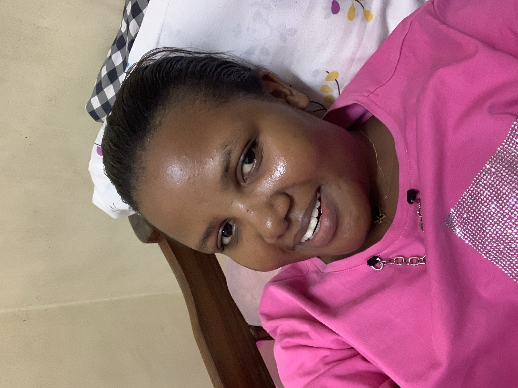Woman photographed relaxing at home in Dar es Salaam