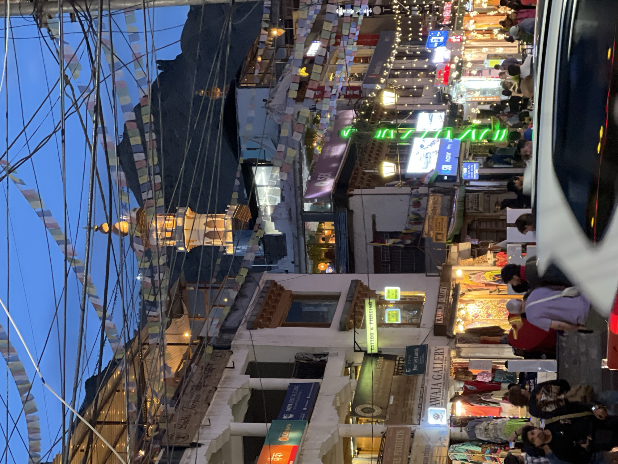 Leh's market streets: prayer flags, murals, and mountain backdrops