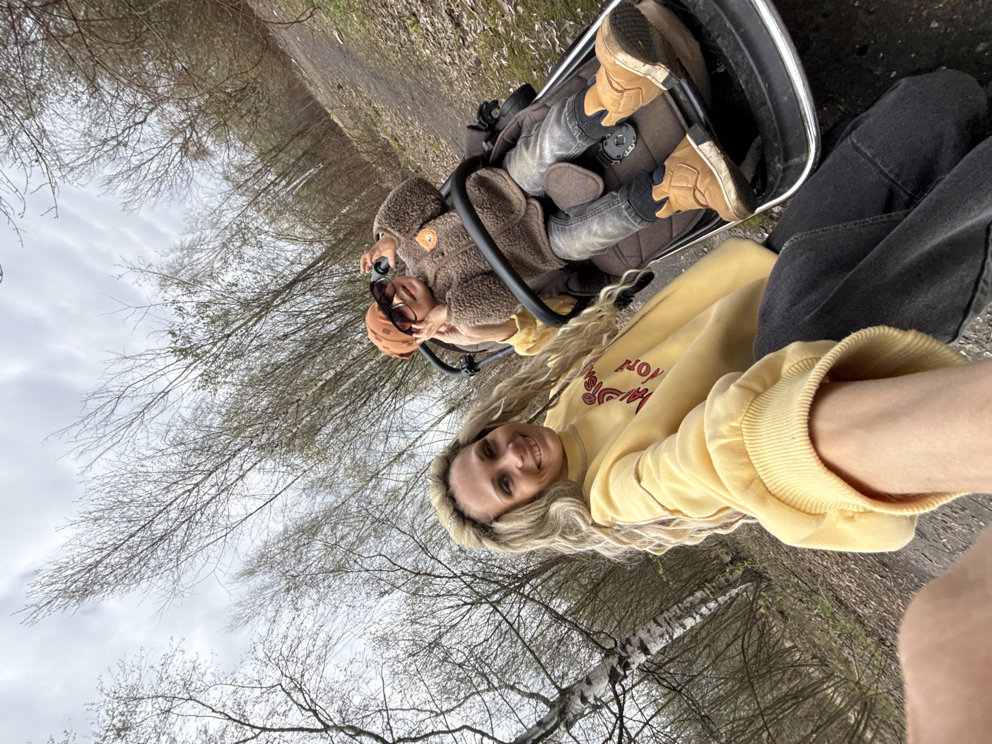 Mother and toddler enjoy morning playground visit in Rusanovo