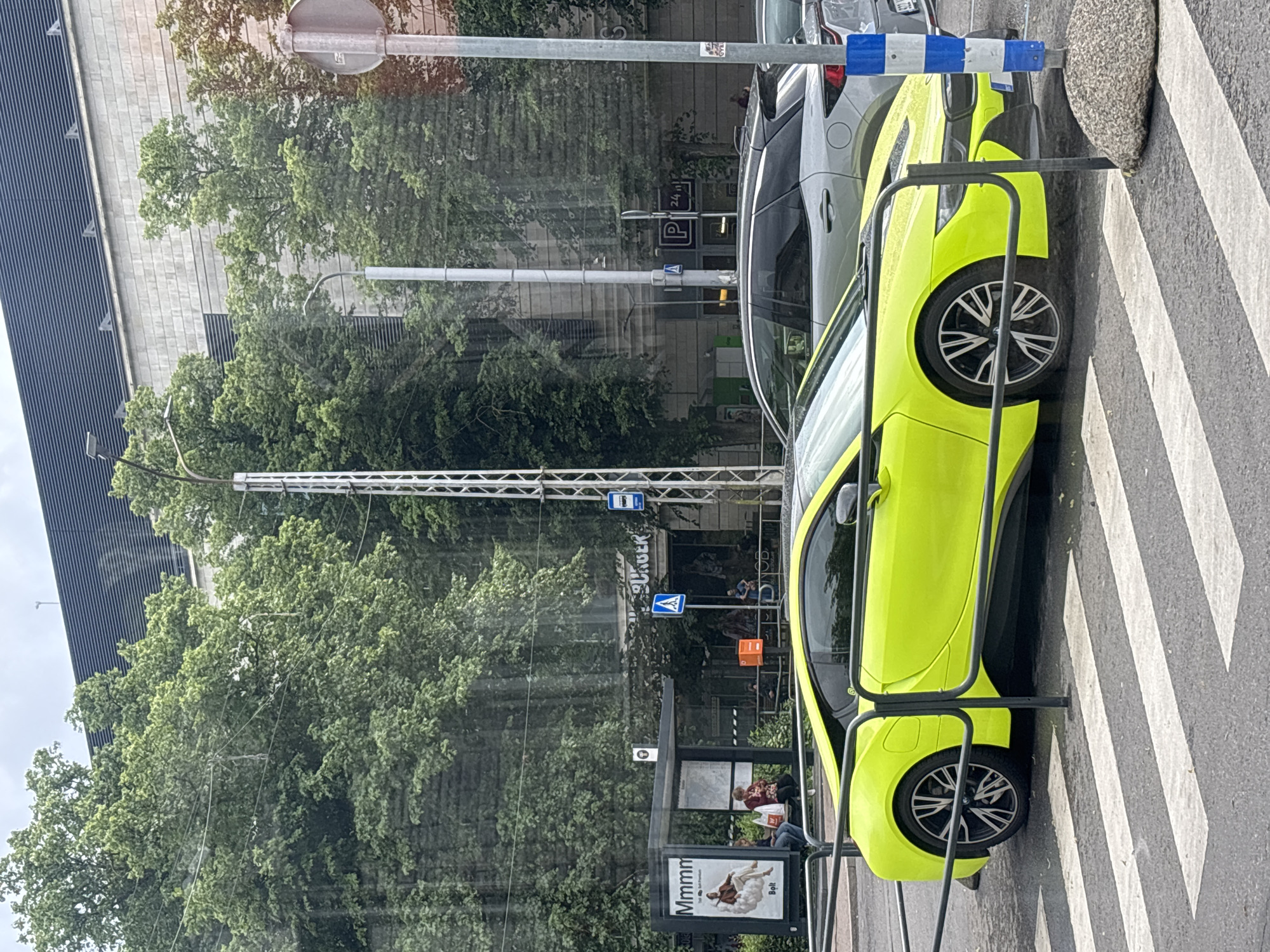 Neon BMW and mixed architecture across central Tallinn