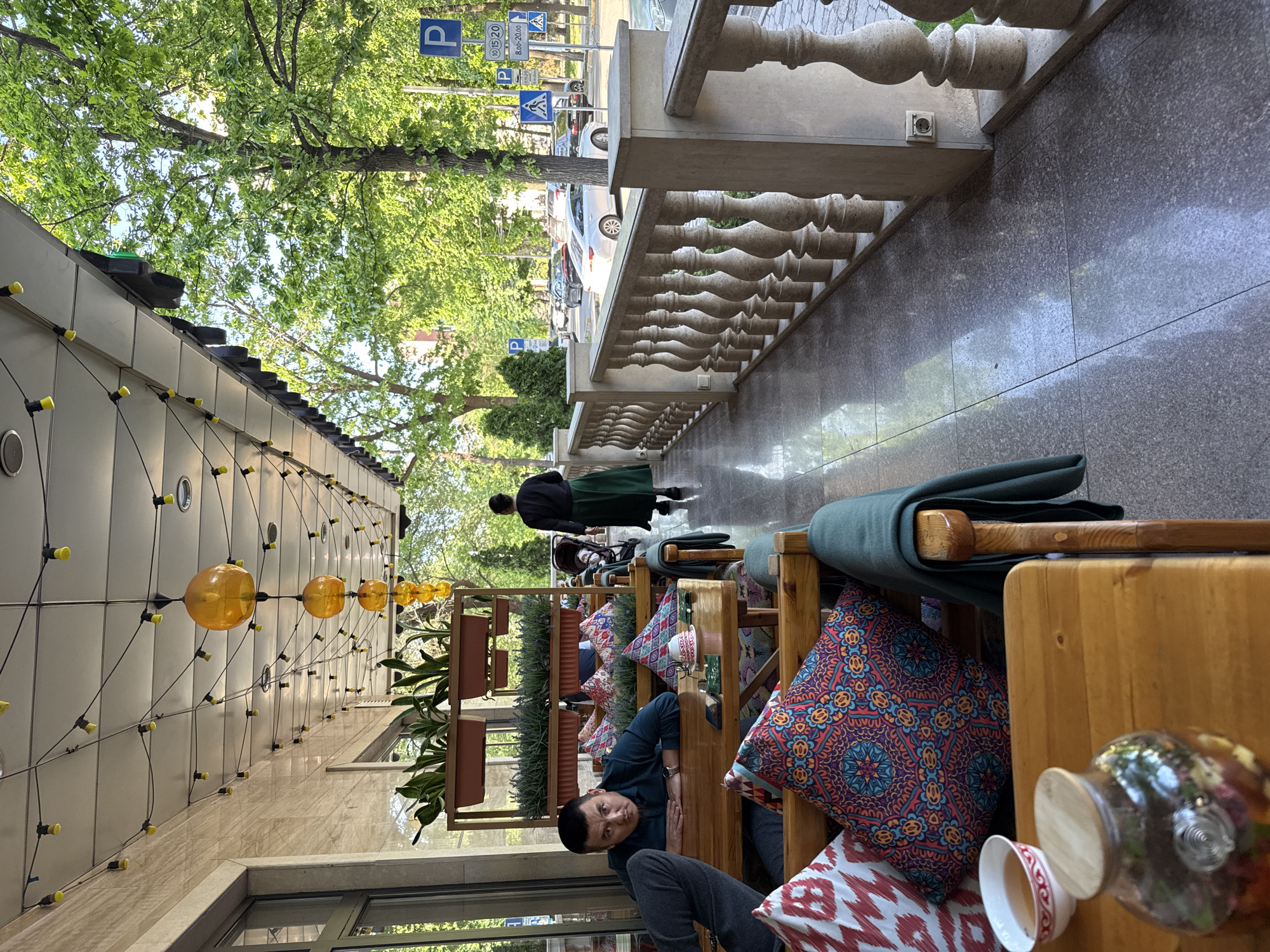 Afternoon tea service at Bishkek outdoor cafe terrace