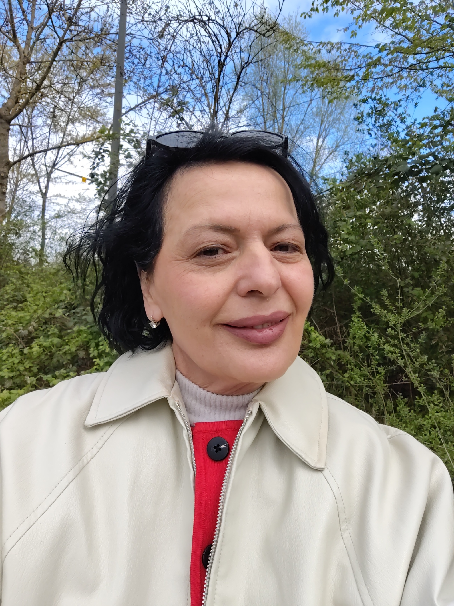 Woman in white jacket photographed in Strasbourg