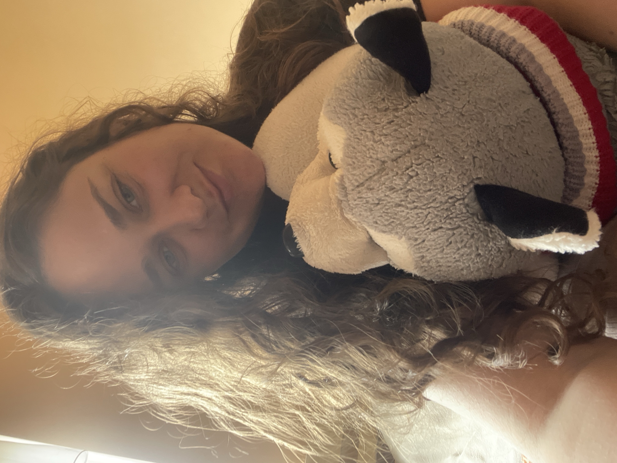 Rainy-sky afternoon with stuffed animals, tea, and art supplies