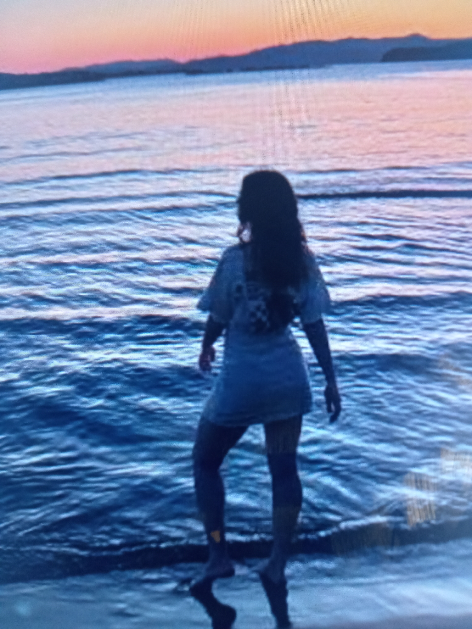 Sunset beach moments: shoreline lounging, waves, and golden hour silhouettes