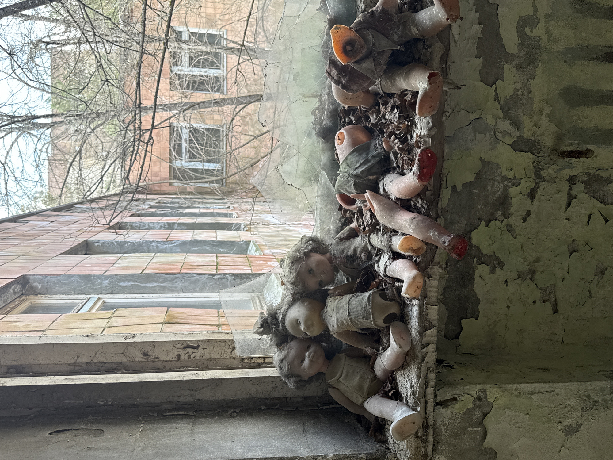 Abandoned buildings with vintage dolls documented in Ukraine