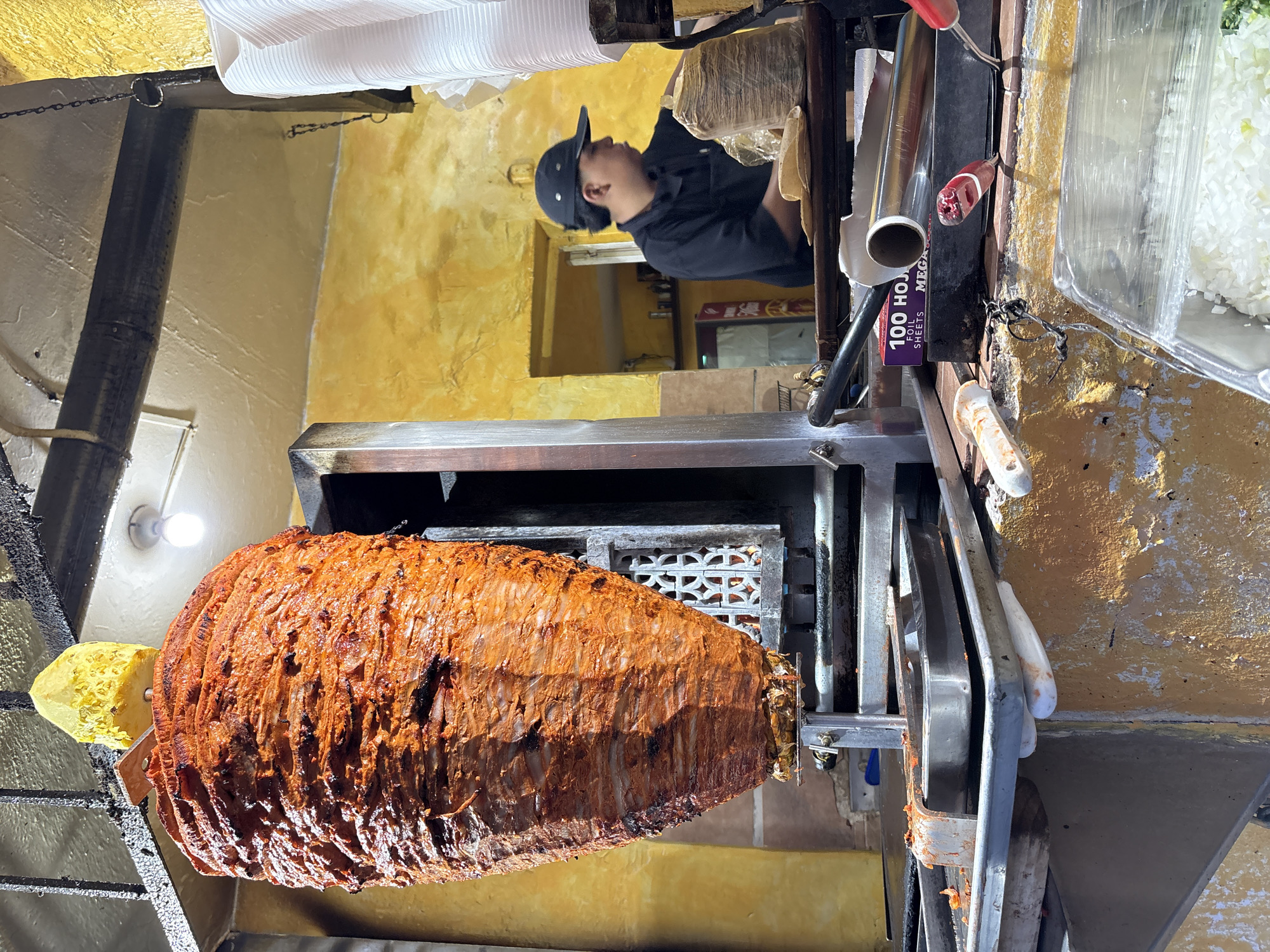 Street vendor prepares tacos al pastor in Cuernavaca