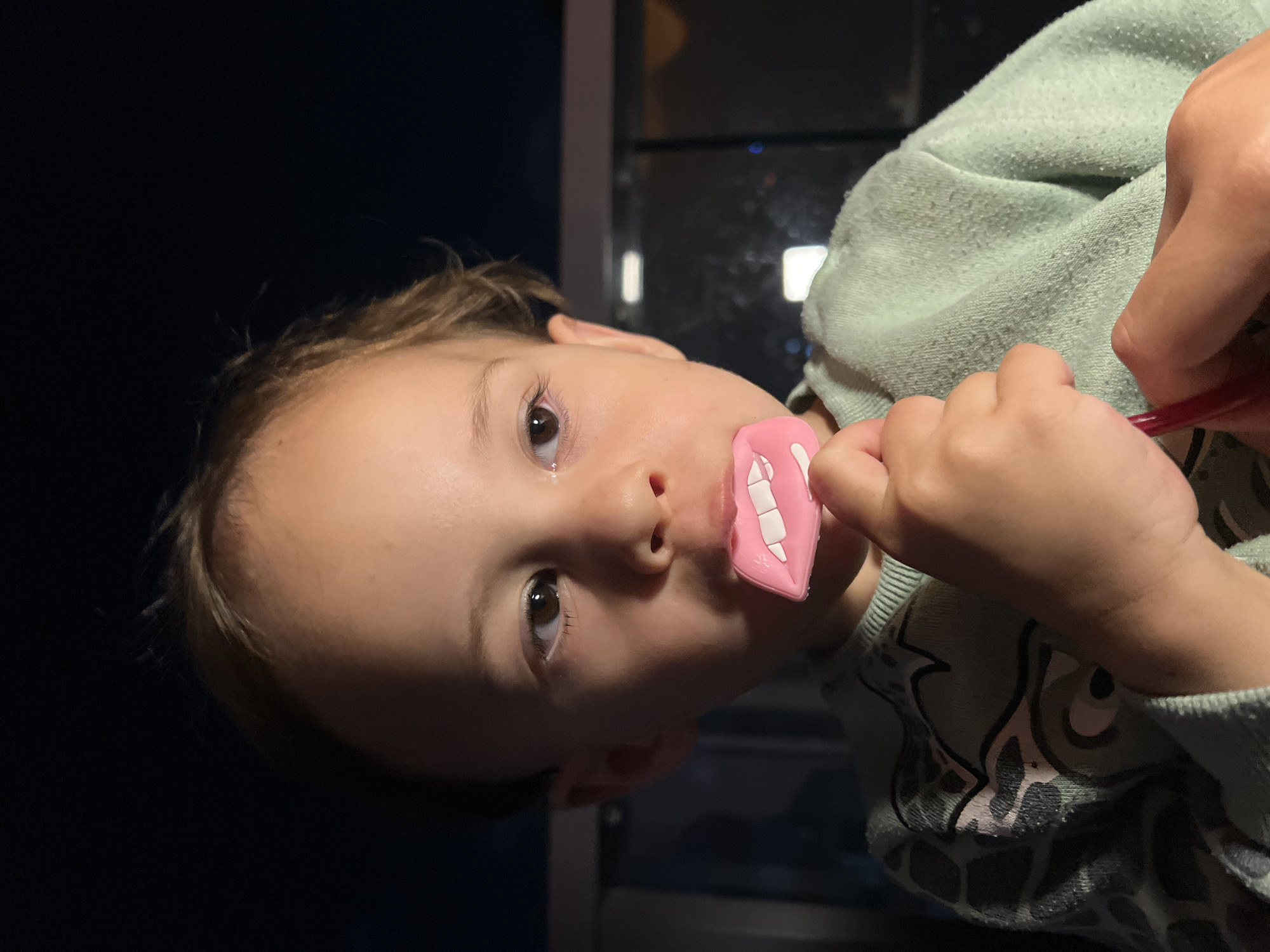 Family dinner with playful child documented in Kiryat Bialik