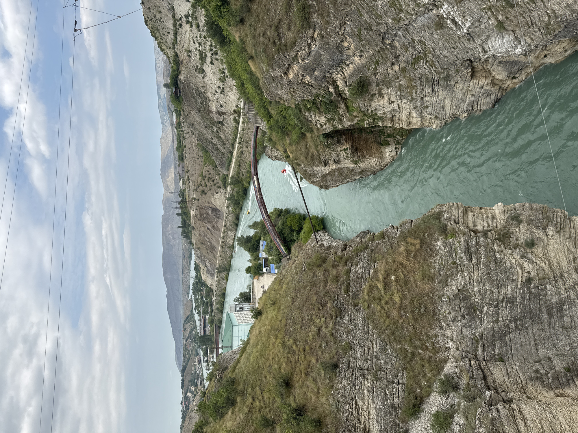 Sulak Canyon: boats, a zipline, and turquoise water below