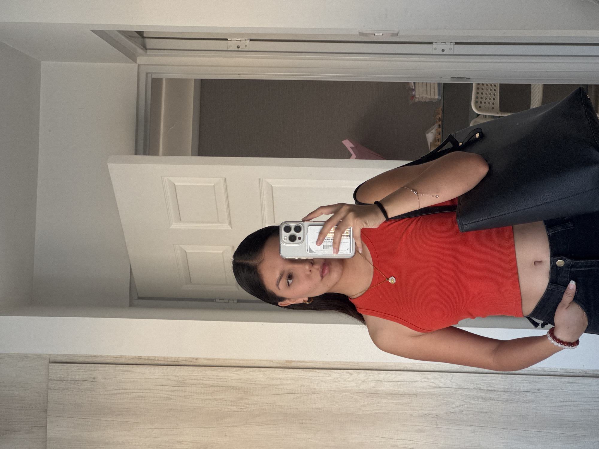 Woman takes mirror selfie in Ocotlán, Mexico
