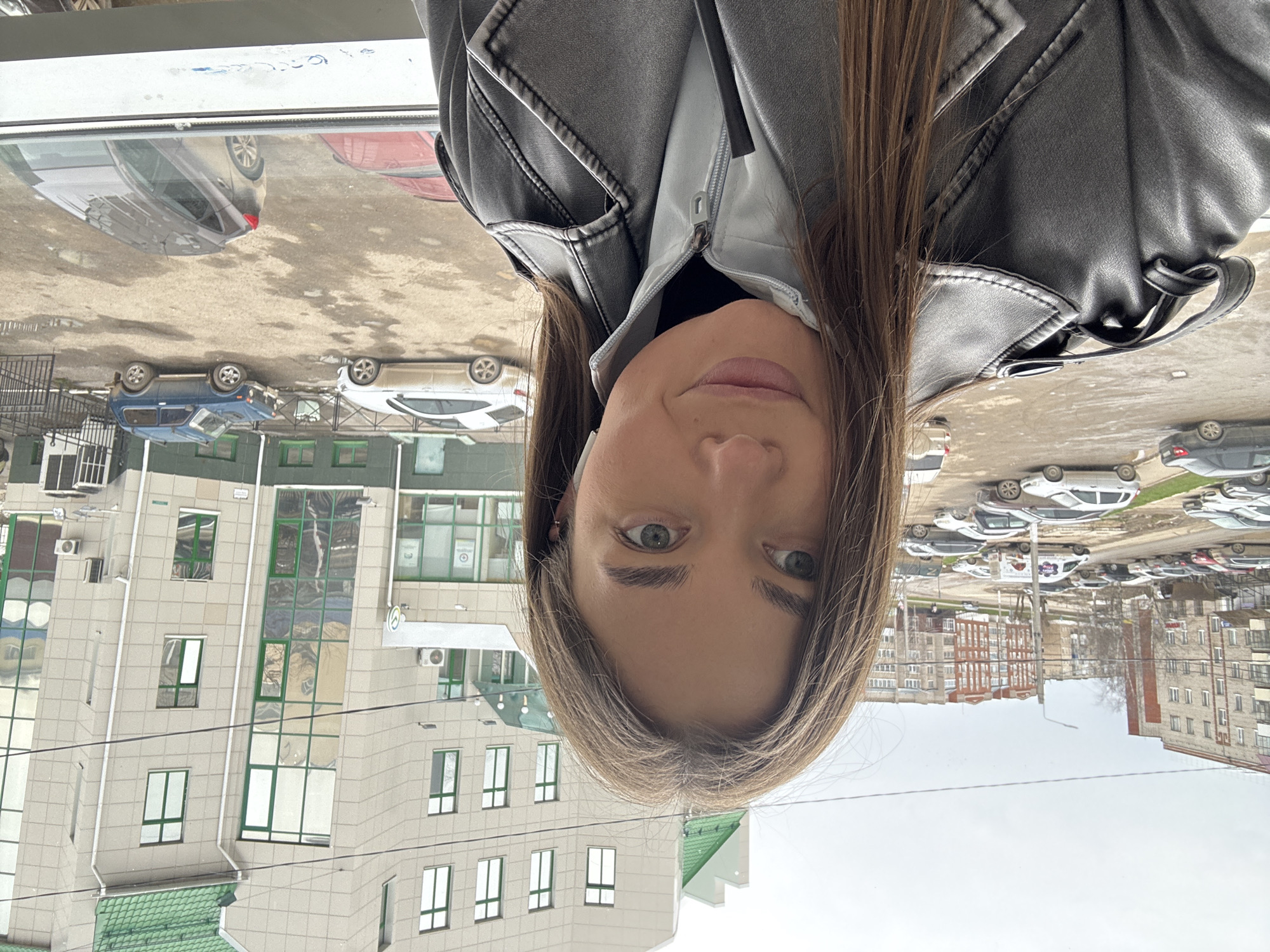 Woman photographed during morning outing in Chernushka, Russia