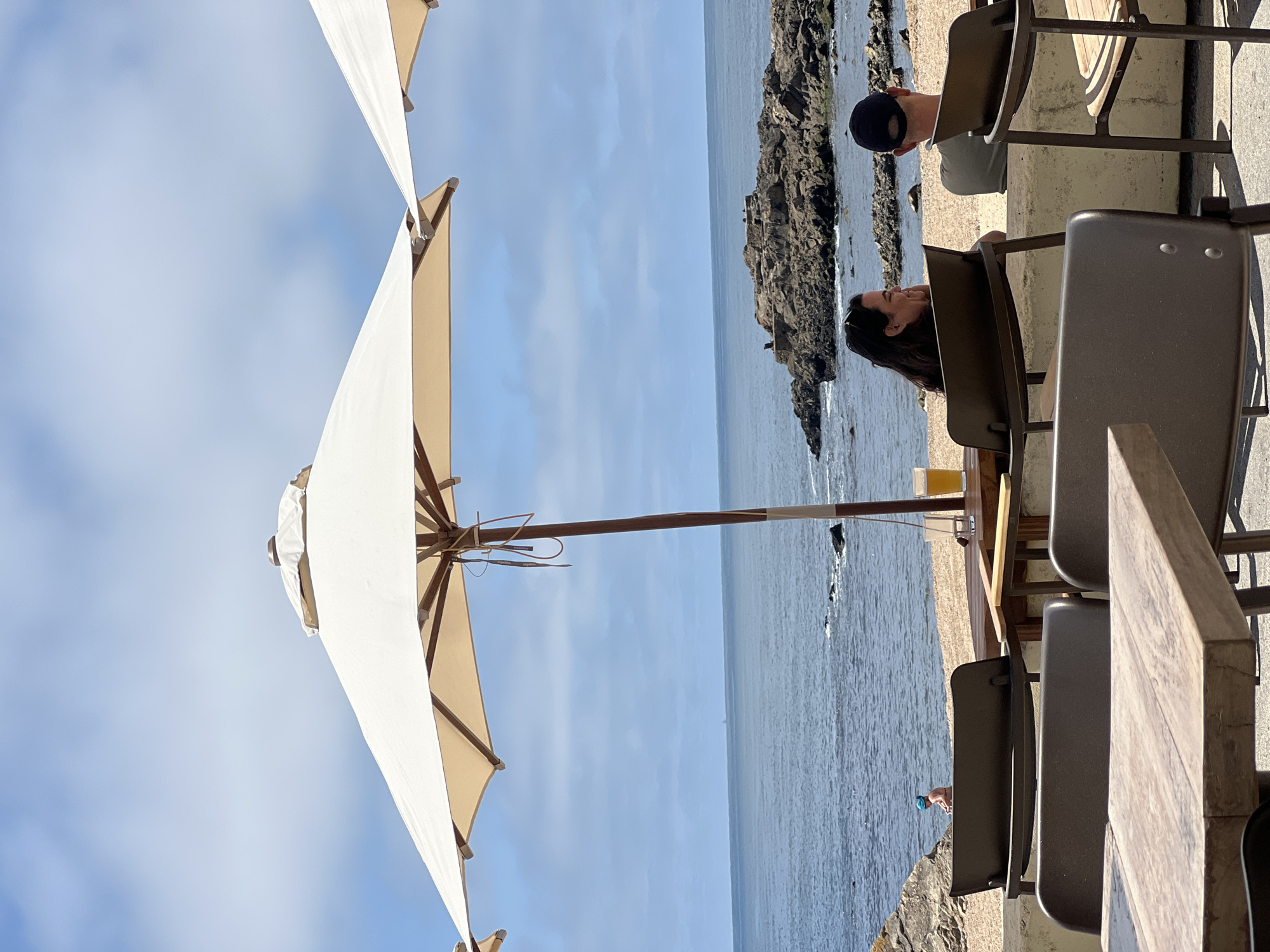 Sunny afternoon at a clifftop café overlooking the Atlantic in Porto