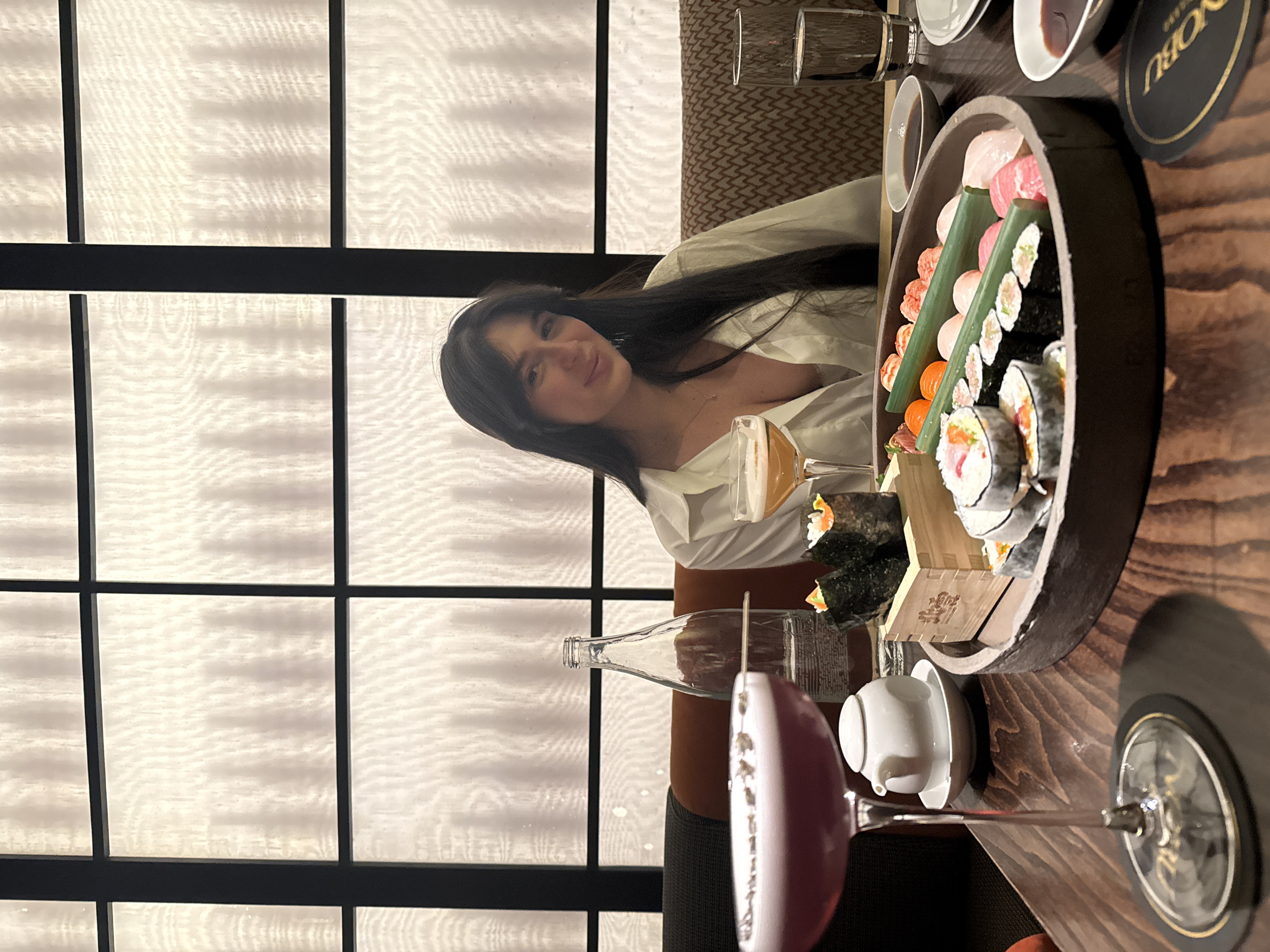 Couple enjoys sushi dinner at upscale Japanese restaurant in Milan