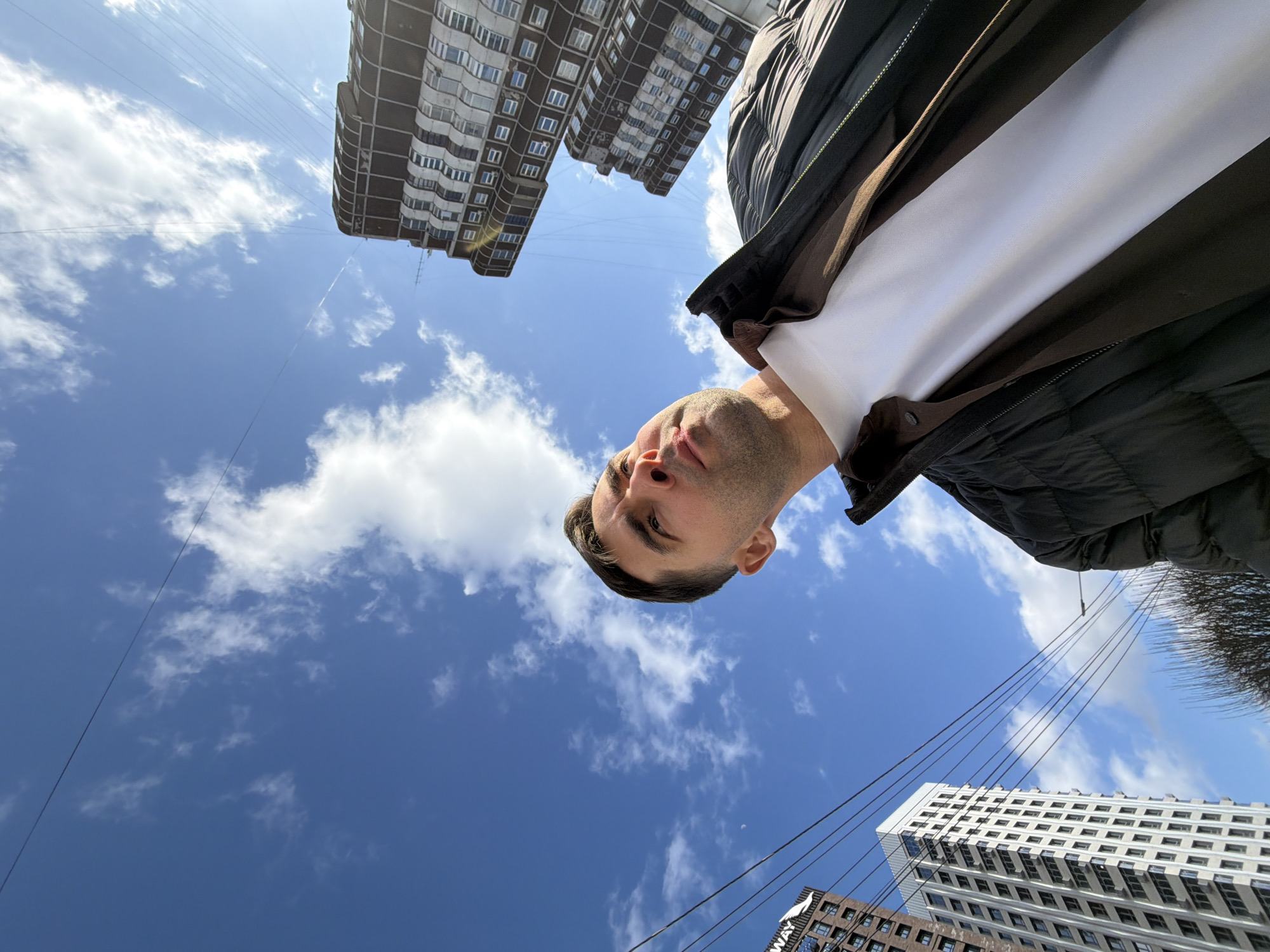 Man documents morning walk through downtown Krasnoyarsk with selfies