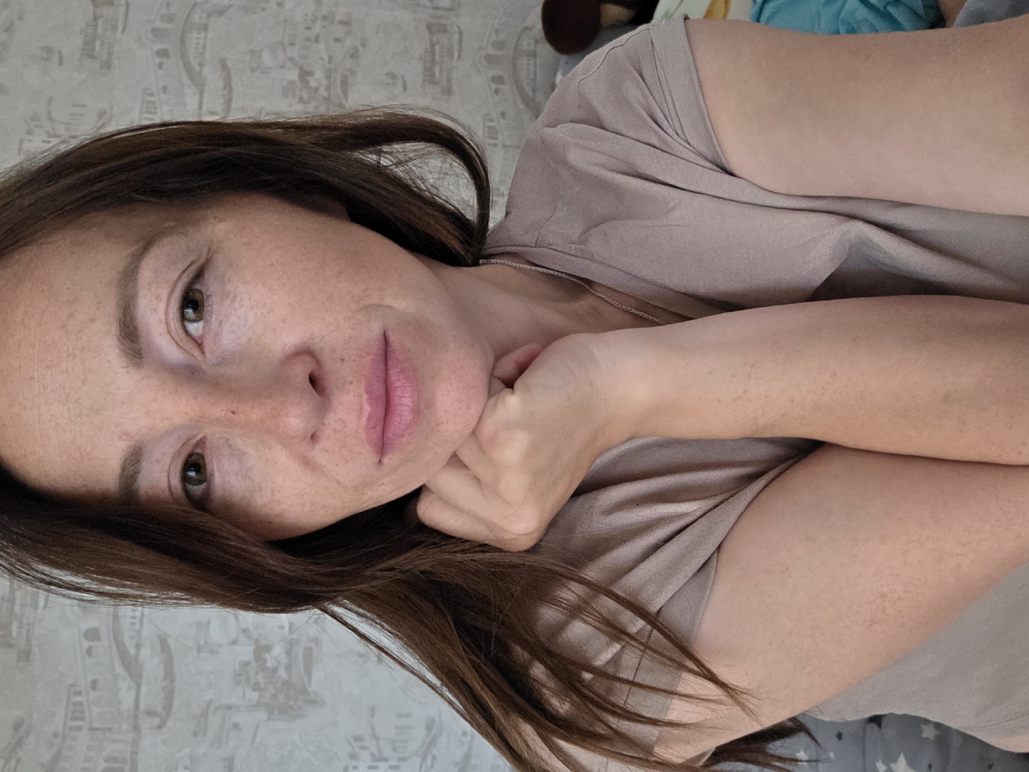 Woman photographed in bedroom poses in Chaikovsky, Russia