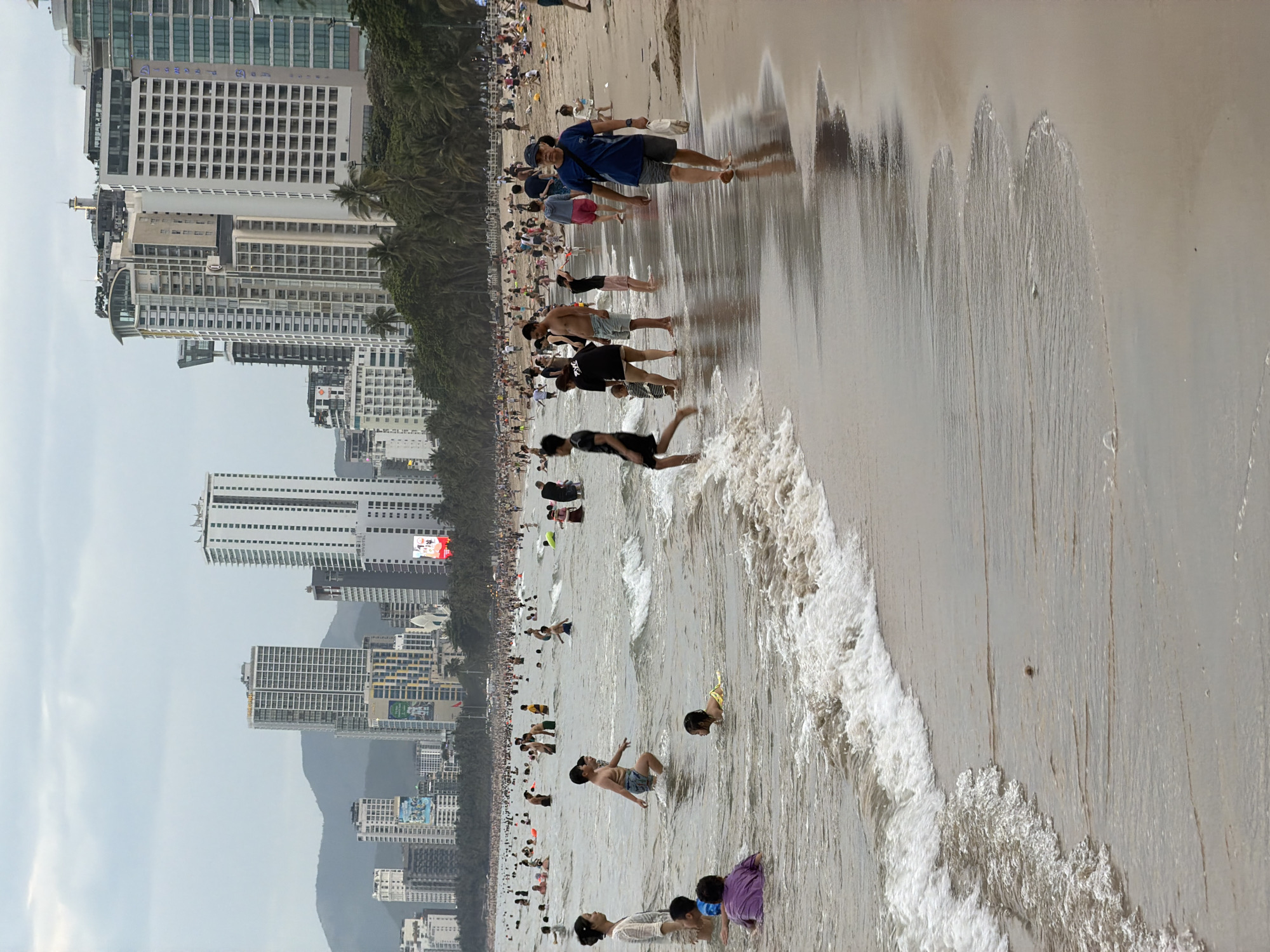 Busy beach day draws crowds to Nha Trang under overcast skies