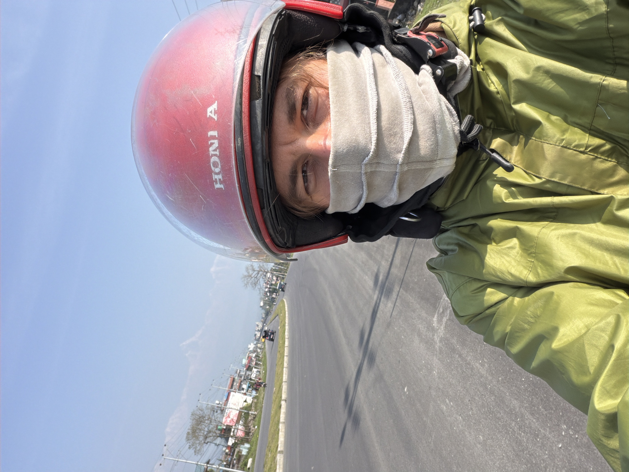 Early morning motorcycle ride through Pokhara streets