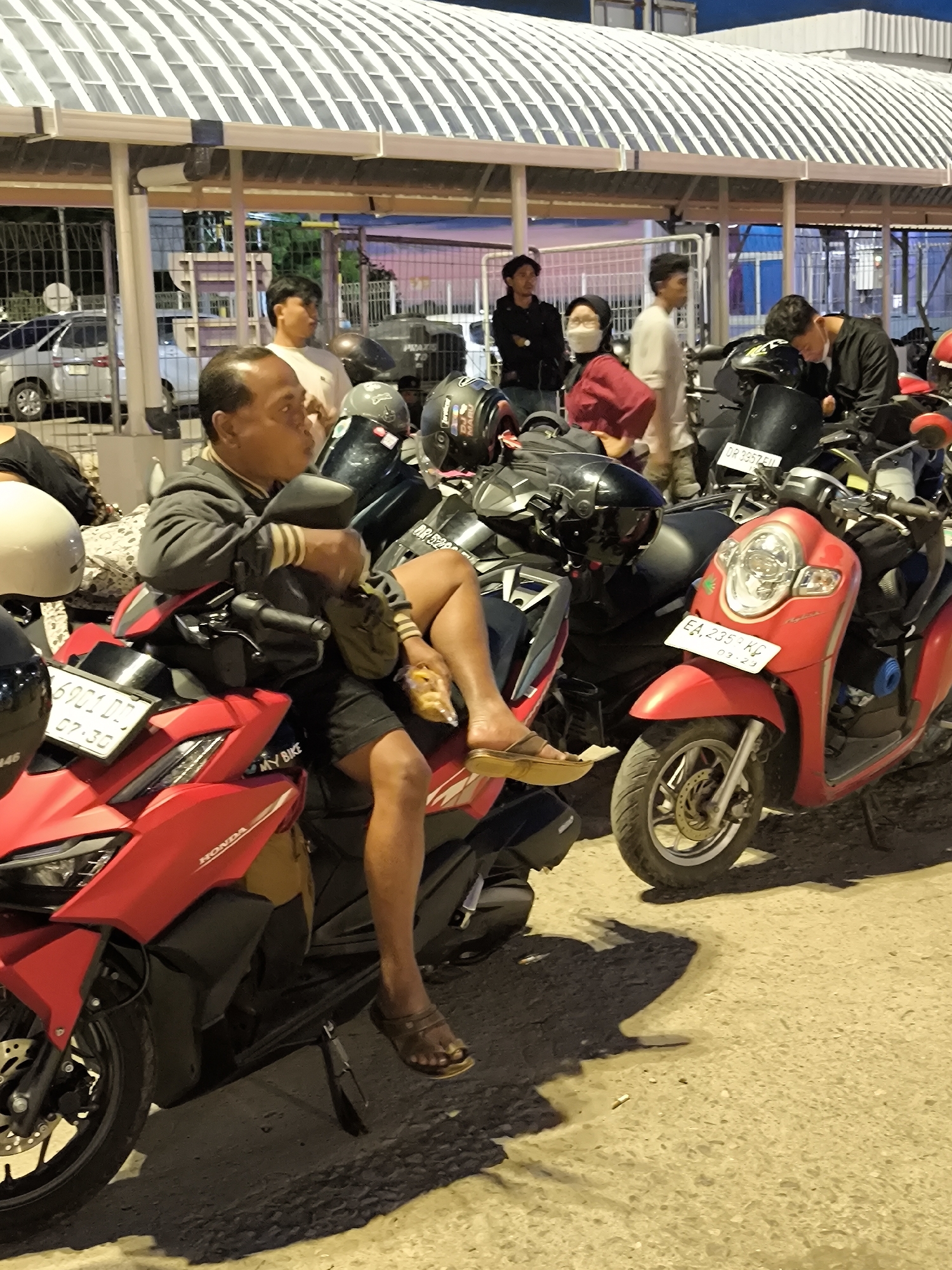 Motorcycle riders gather, travel on ferries in unknown location