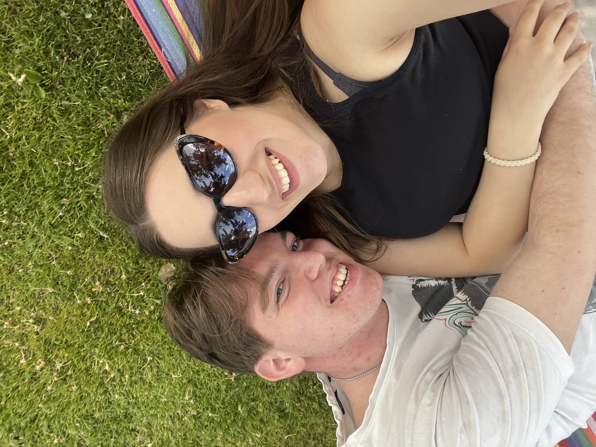 Couple enjoys afternoon hammock time in Bulgarian suburb