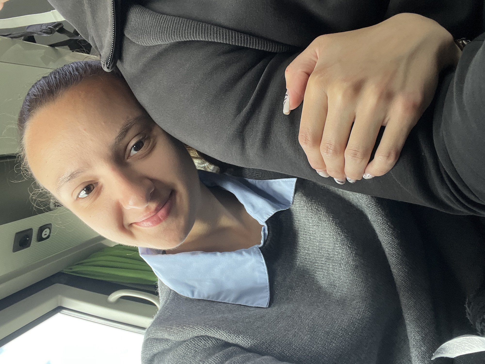 Woman takes selfie during train journey in Saarbrücken