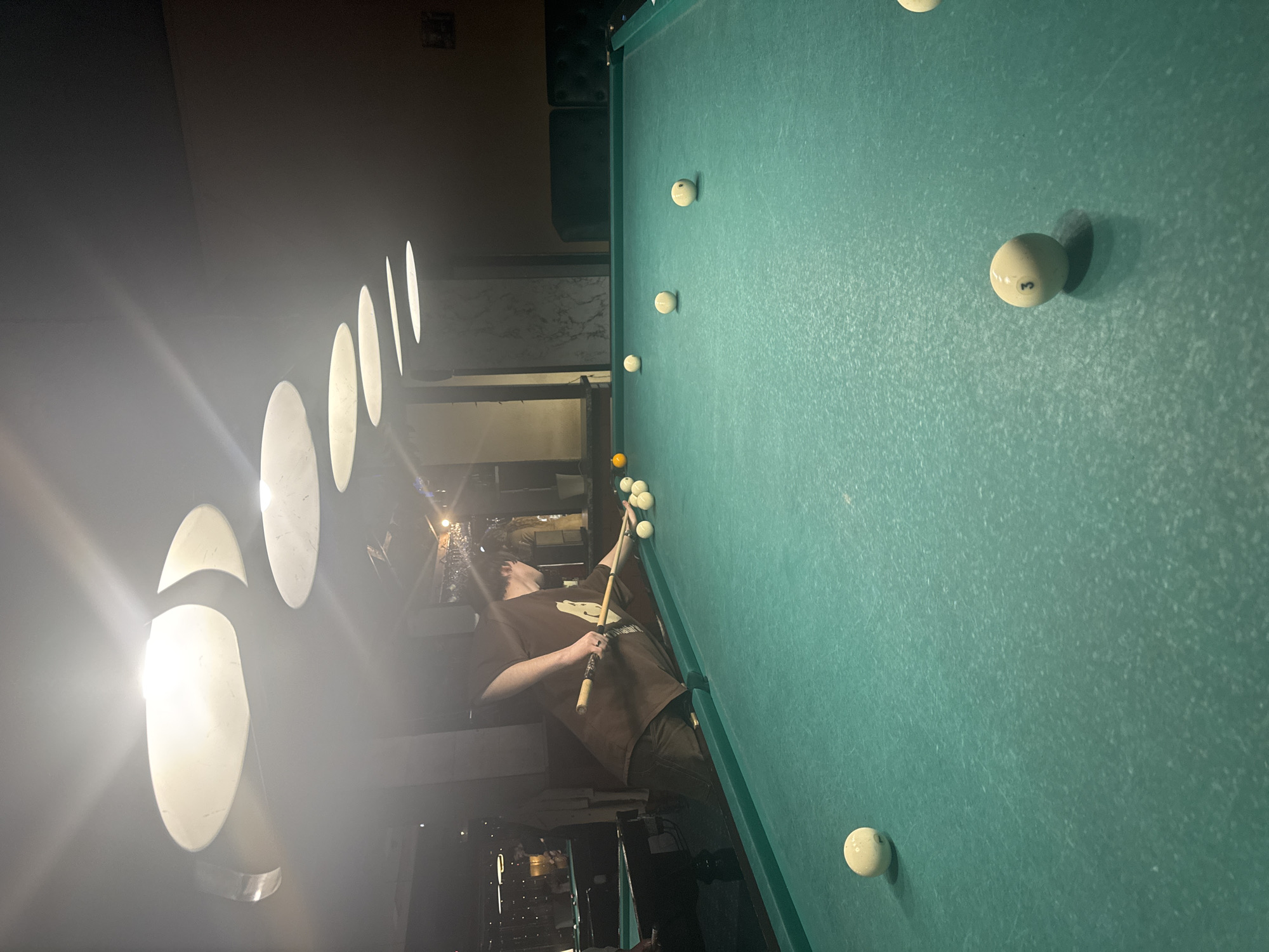 Billiards game captured at Moscow venue during evening hours