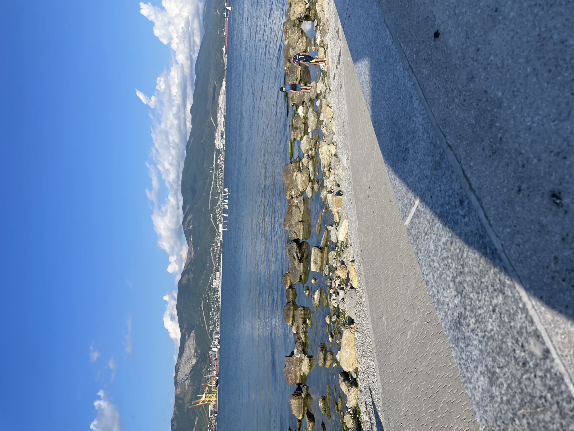 Novorossiysk harbor and coastline on a sunny afternoon