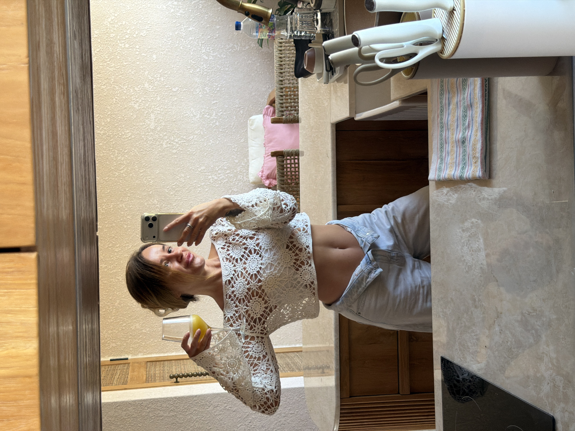 Mirror selfies across kitchen and bathroom in Mengwi, Bali