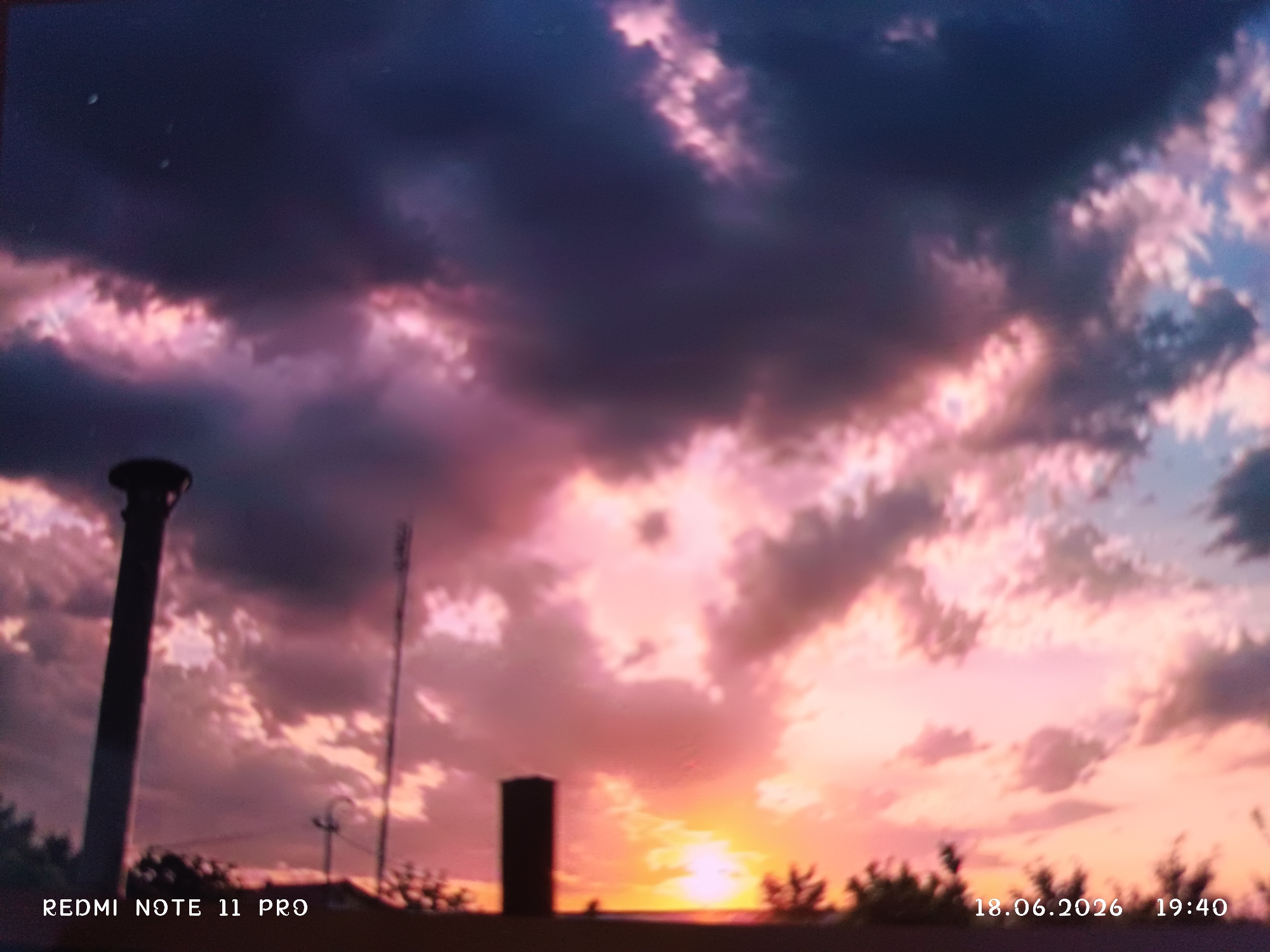 Dusk settles over Chirchik with color, flowers, and fire