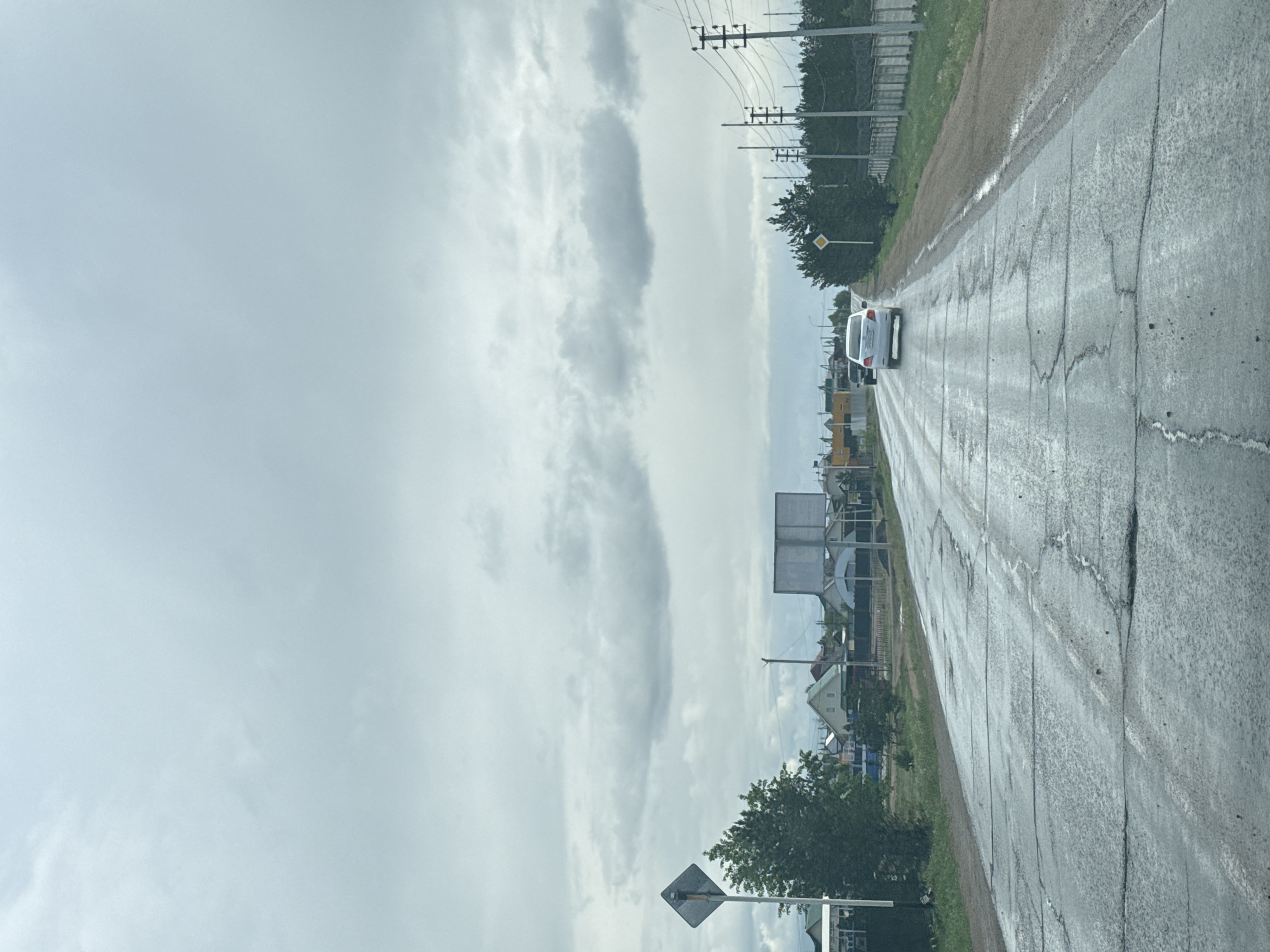 Morning journey documented: wet roads, dragon fruit, neighborhood scenes