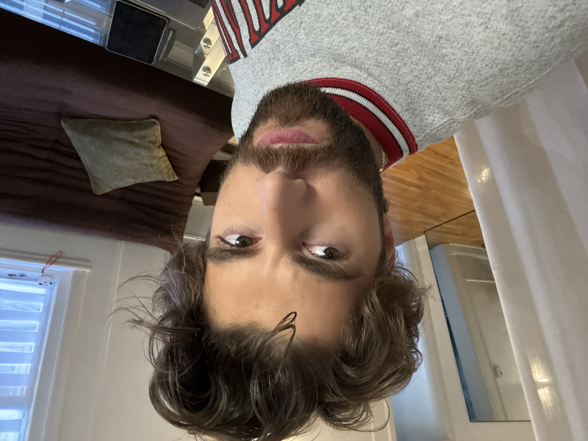 Man photographed upside down while winking in Montreal