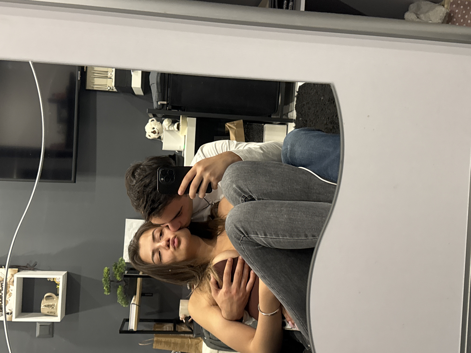 Couple captures mirror selfies in Sofia apartment