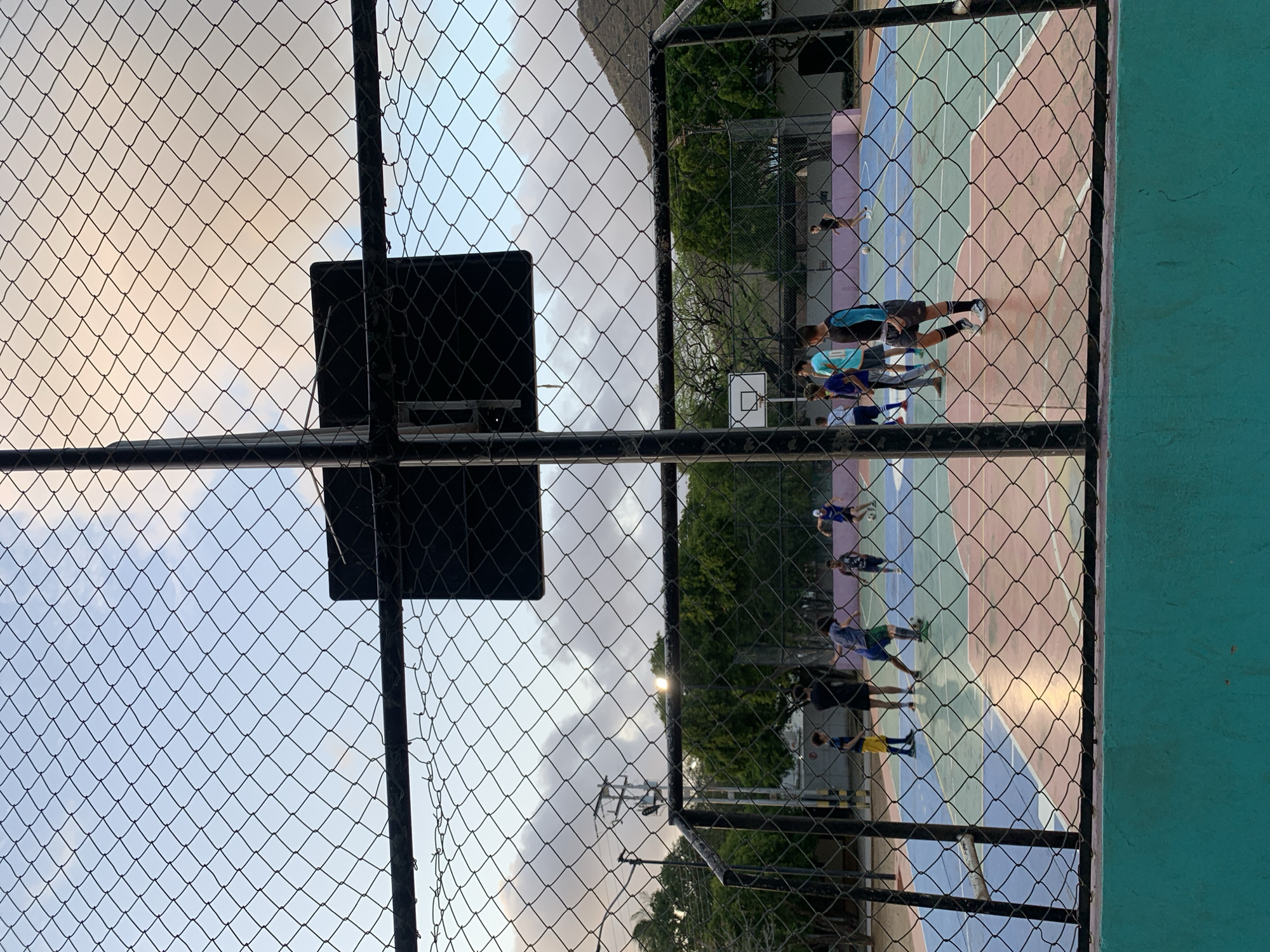 Evening street life and youth sports captured in Santa Ana, Venezuela