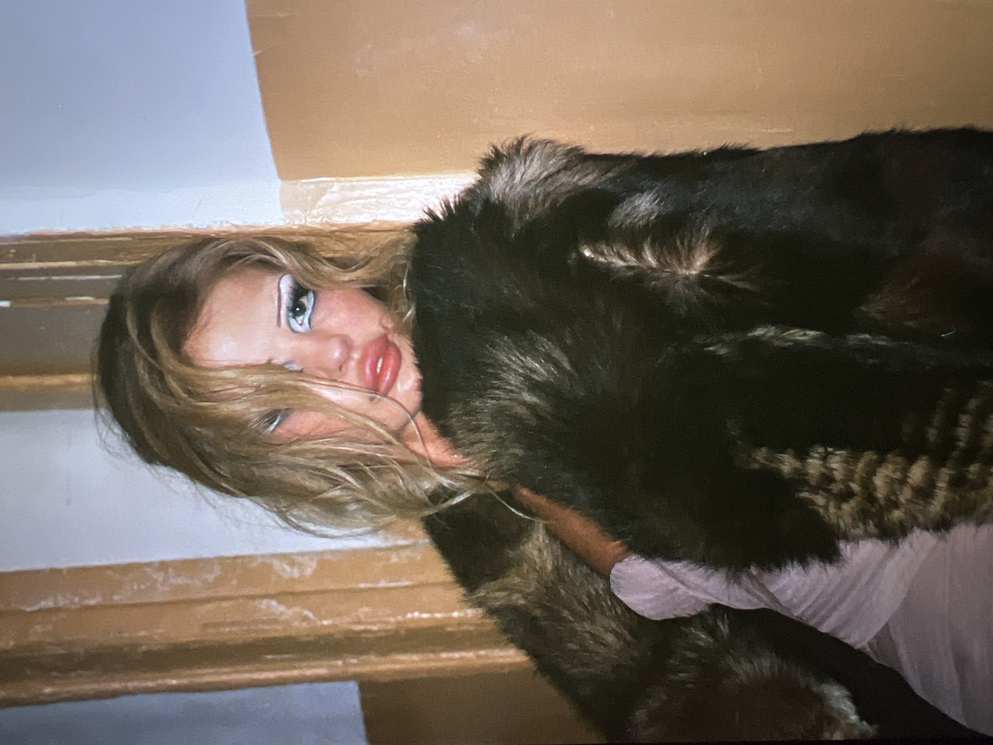 Editorial shoot in a rundown Saint Petersburg interior, fur coats and drama