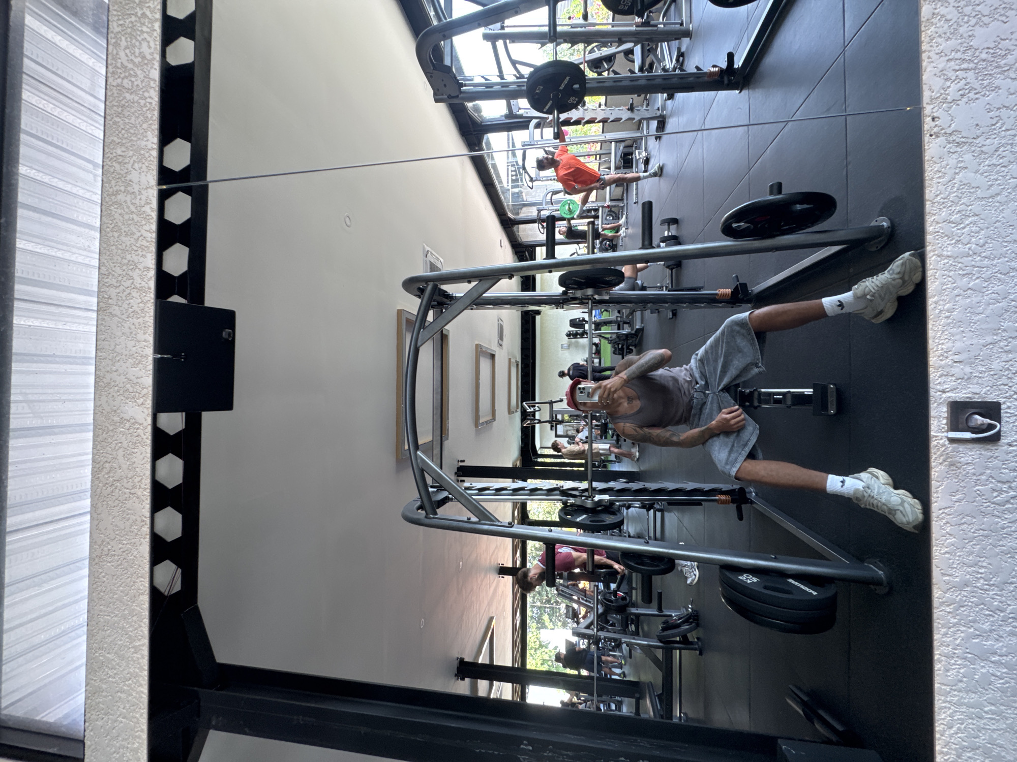 Gym mirror selfie on a weight bench in Kuta Selatan