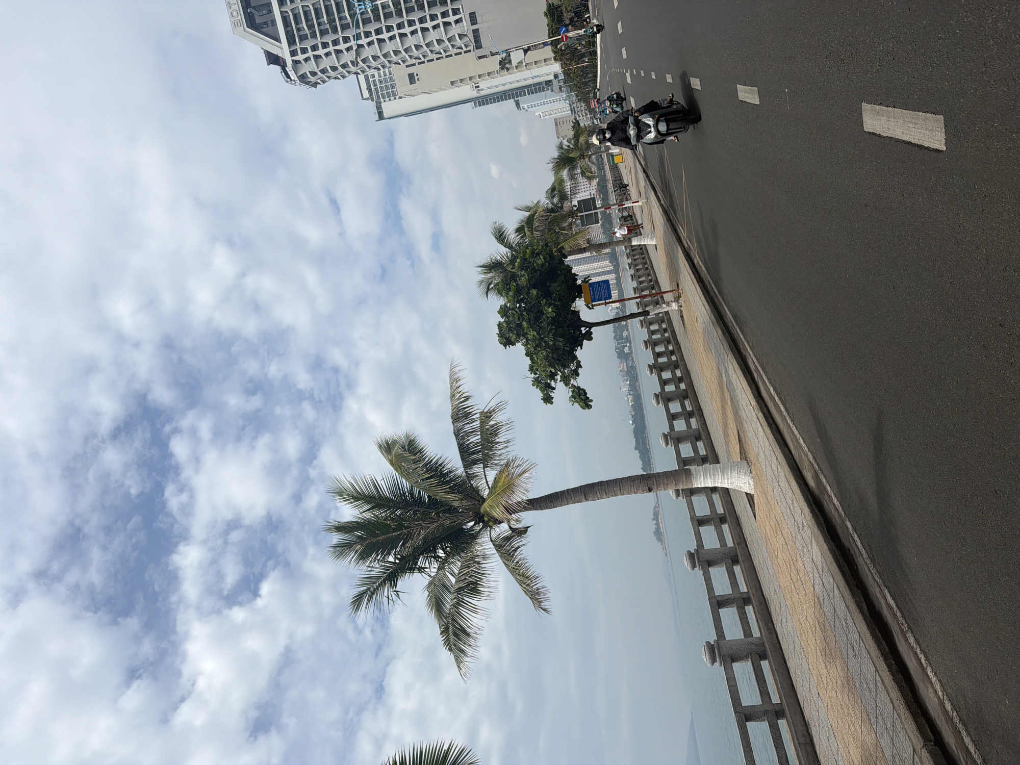 Cloudy coastal street scene documented in Nha Trang, Vietnam