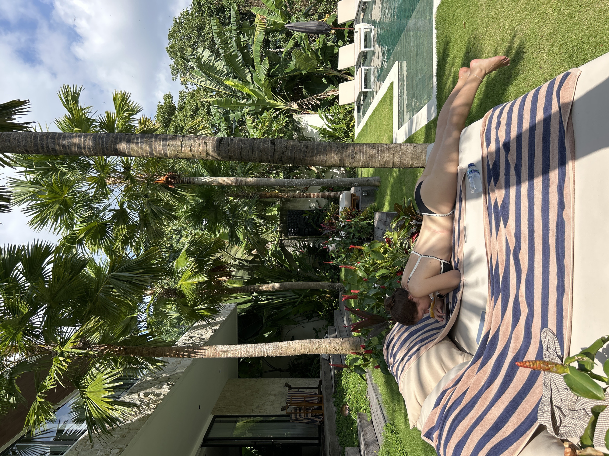 Lazy poolside day at a Kediri villa with pets in tow