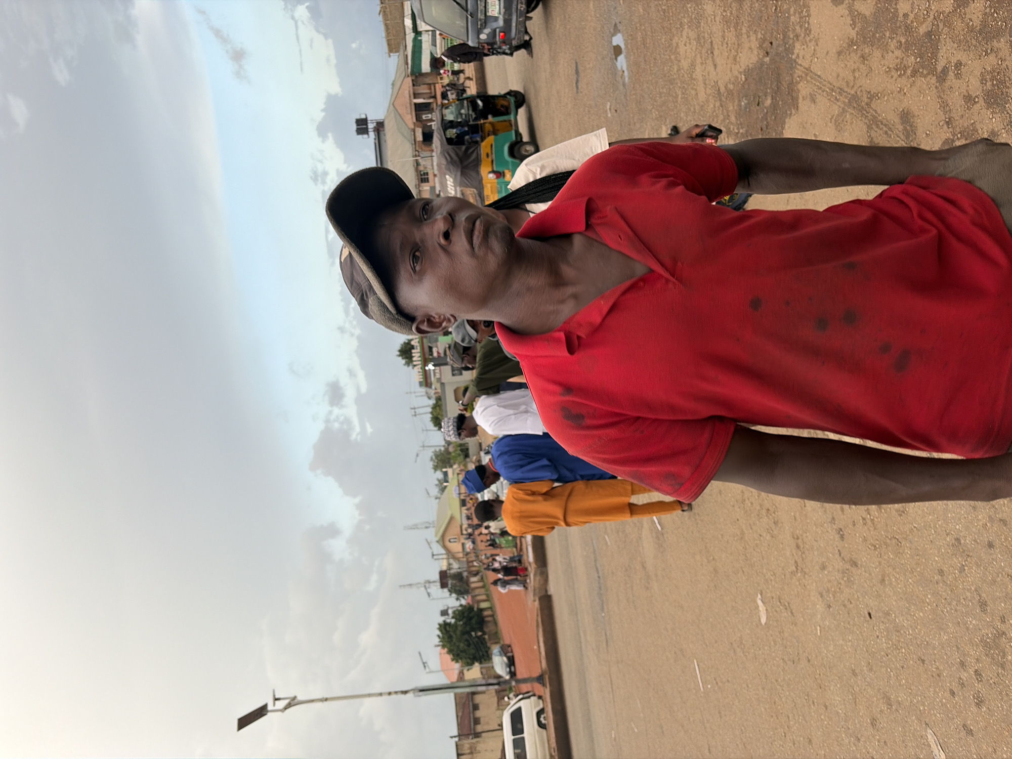 Afternoon street and market activity in Gura Top, Nigeria