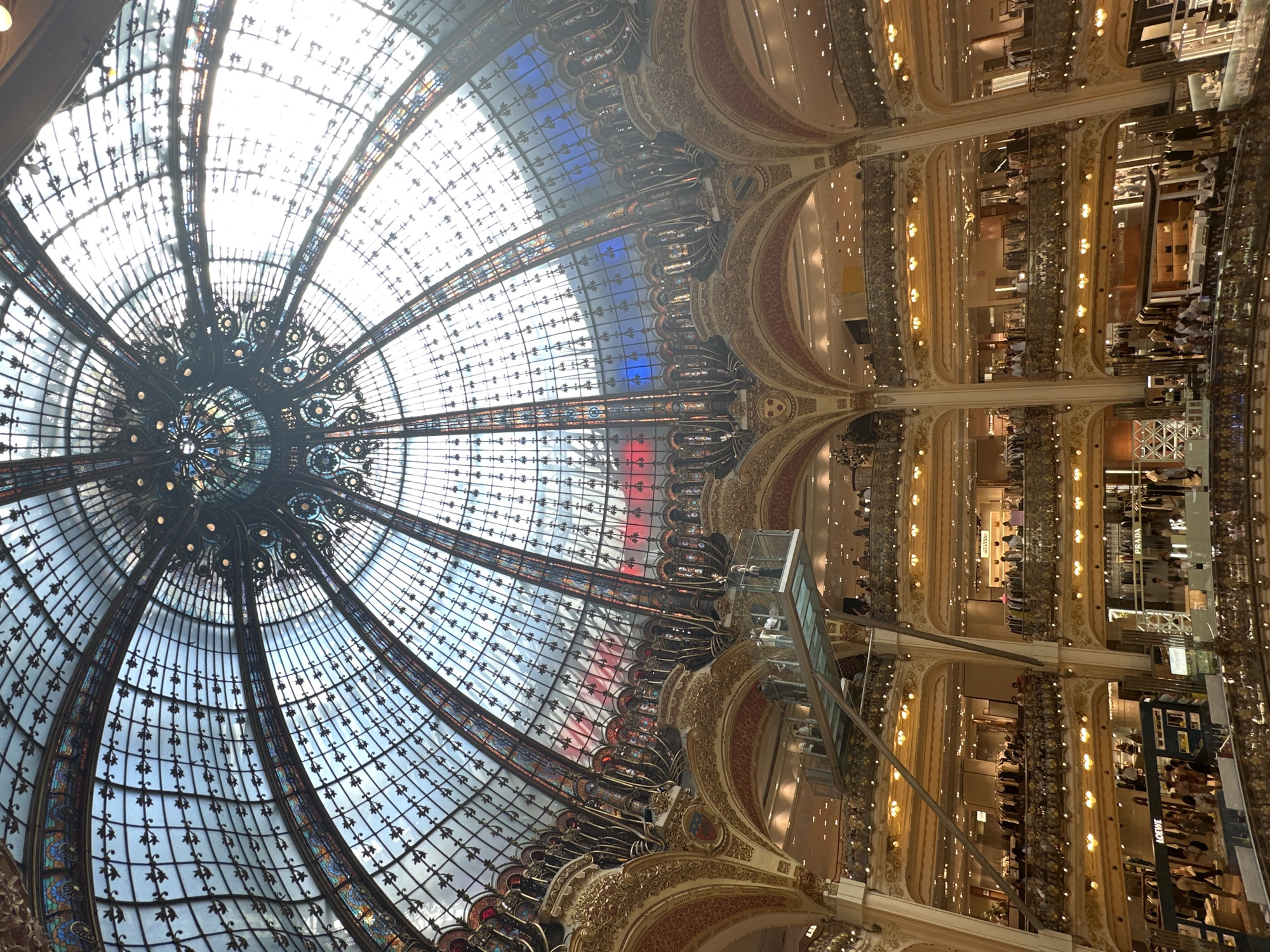 Art Nouveau dome and grand interior of a Parisian department store