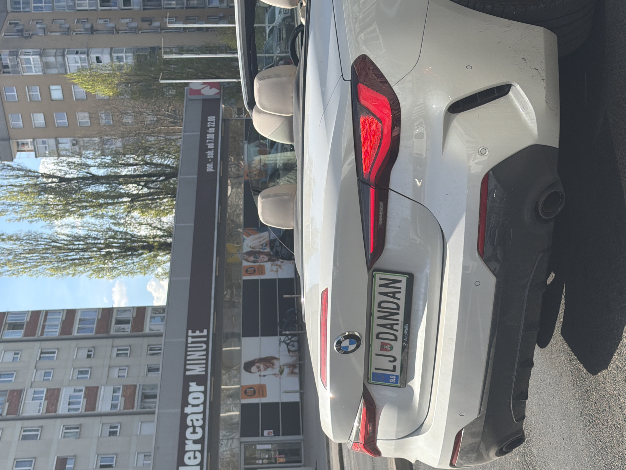 White BMW convertible spotted at Ljubljana convenience store
