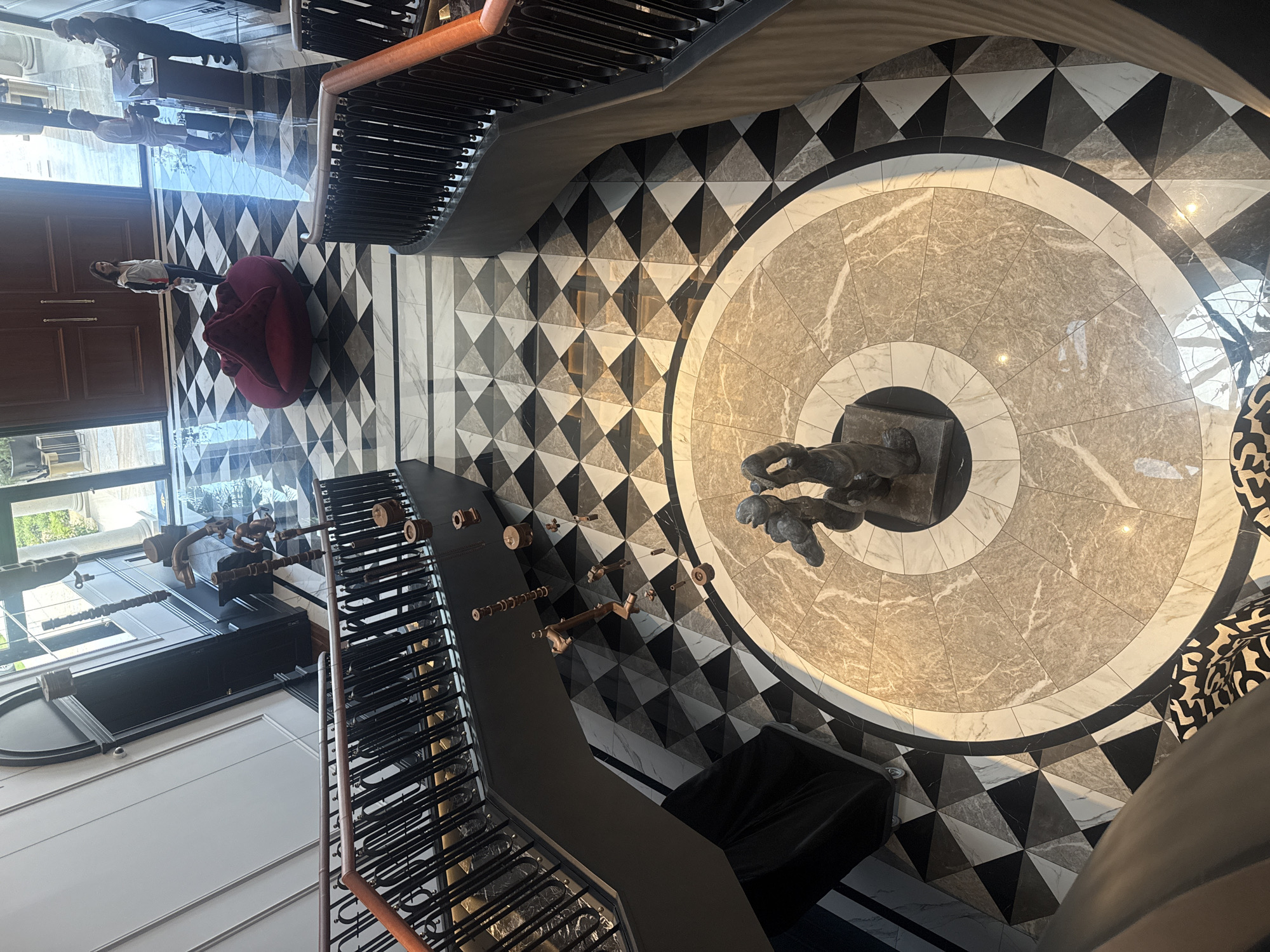 Luxury building interior with stone sculpture documented in Vila Verde