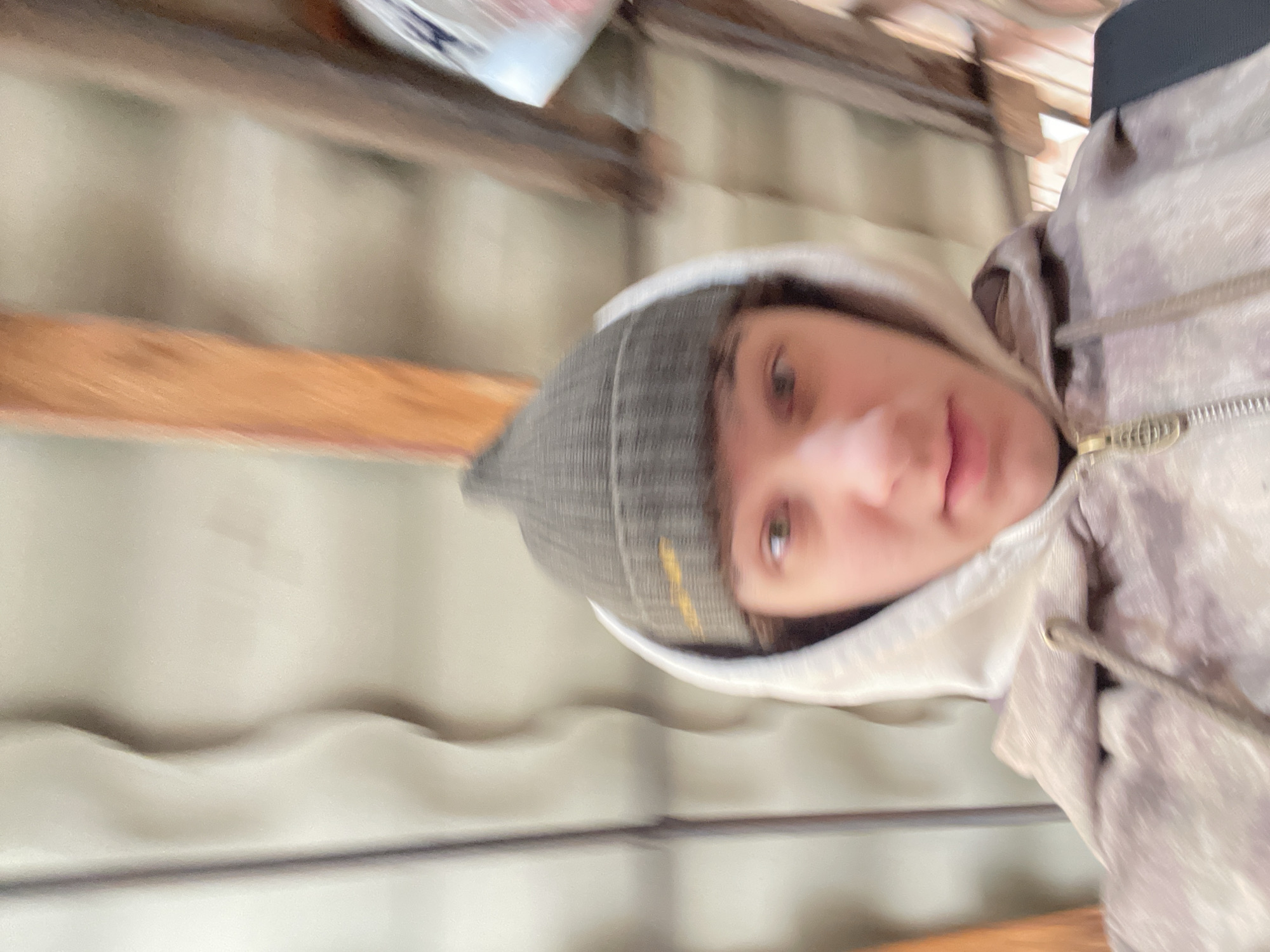 Person takes rotated selfie indoors in Krasnoyarsk, Russia