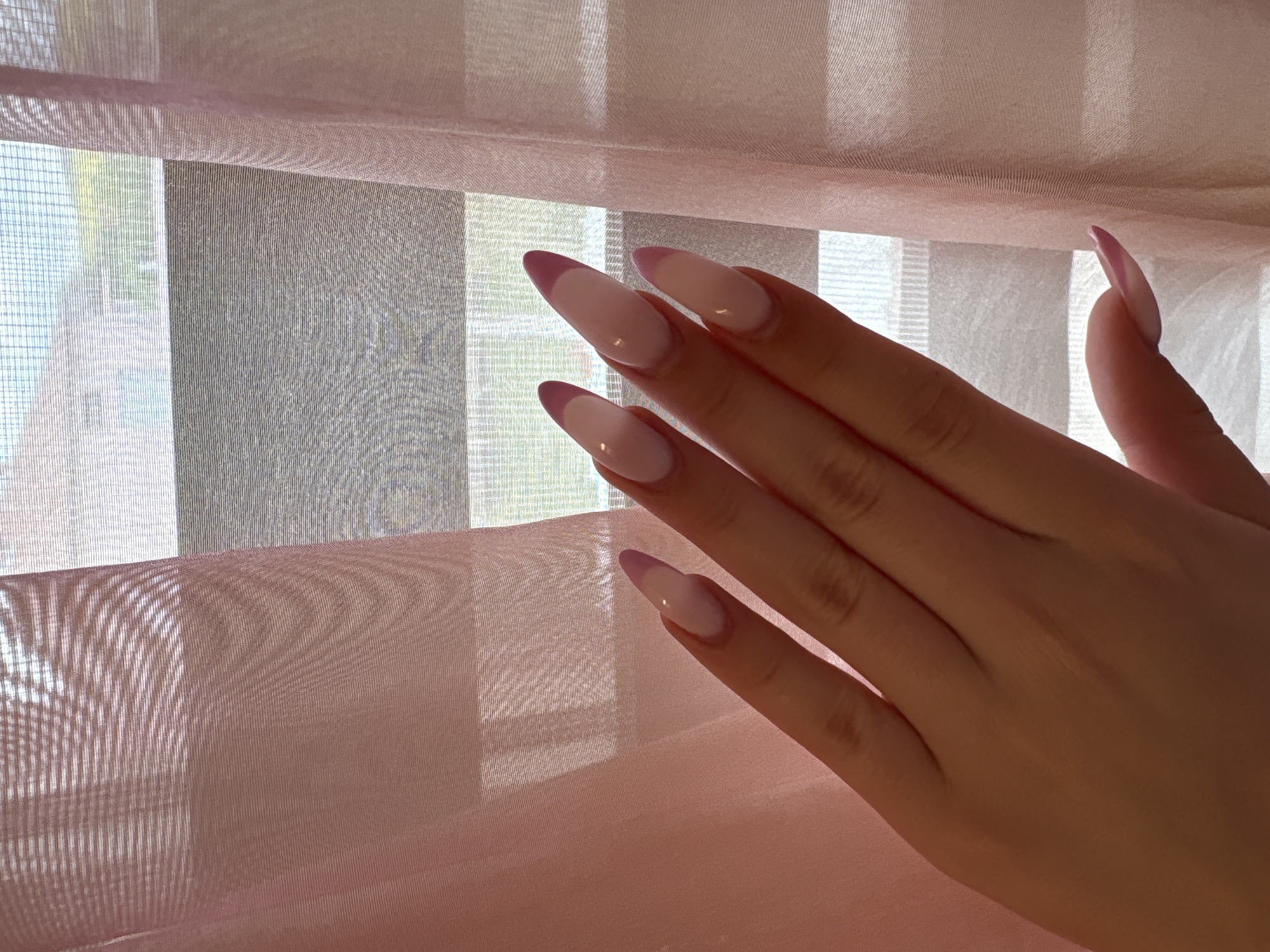 Pink French manicure documented in Bulgarovo, Bulgaria