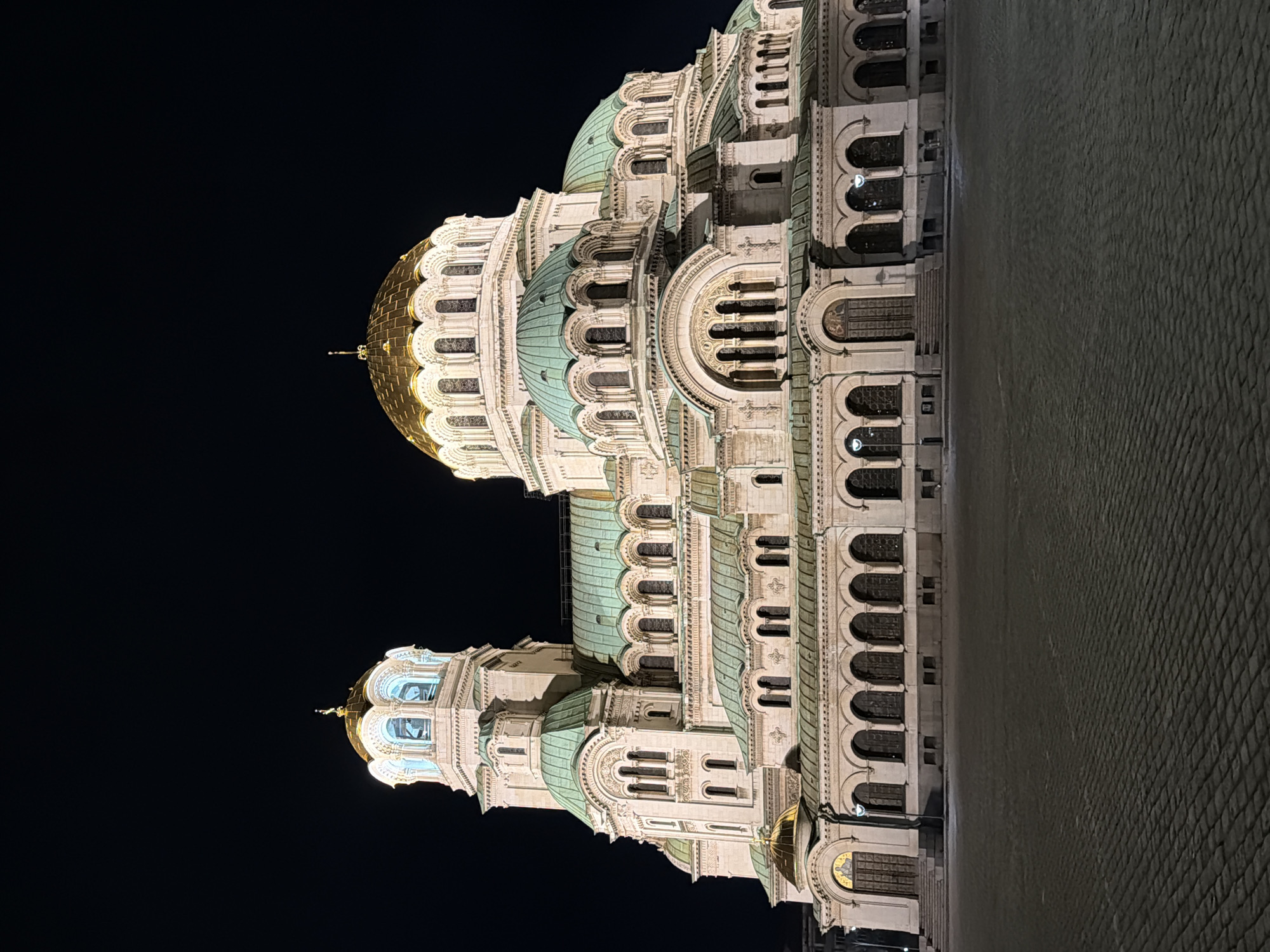 Nighttime documentation of illuminated Sofia landmarks and streets